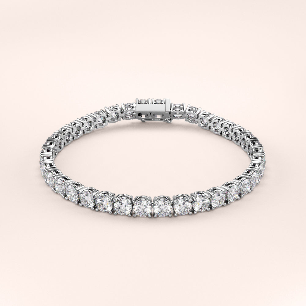 Elegant diamond tennis bracelet featuring round brilliant cut diamonds in a secure four-prong setting. Available in 14K or 18K white, yellow, or rose gold. Timeless luxury and radiant sparkle for any occasion. |
#14KRecycledWhiteGold
#18KRecycledWhiteGold
#Platinum