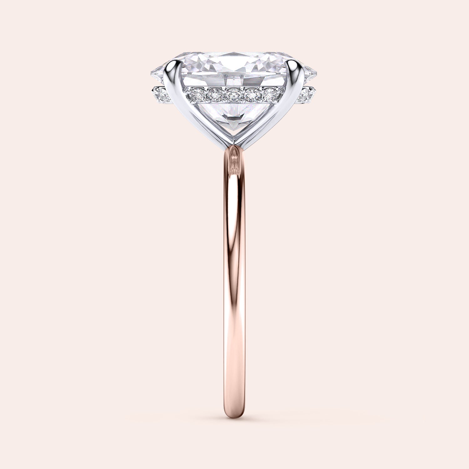 Two-tone 14K/18K white and rose gold engagement ring featuring an oval-cut diamond in a heart-shaped secret halo design. |
#14KRecycledRose/WhiteGold
#18KRecycledRose/WhiteGold