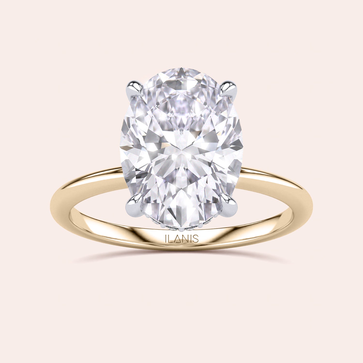 Two-tone 14K/18K gold engagement ring featuring an oval-cut diamond in white and yellow gold design. |
#14KRecycledYellow/WhiteGold
#18KRecycledYellow/WhiteGold