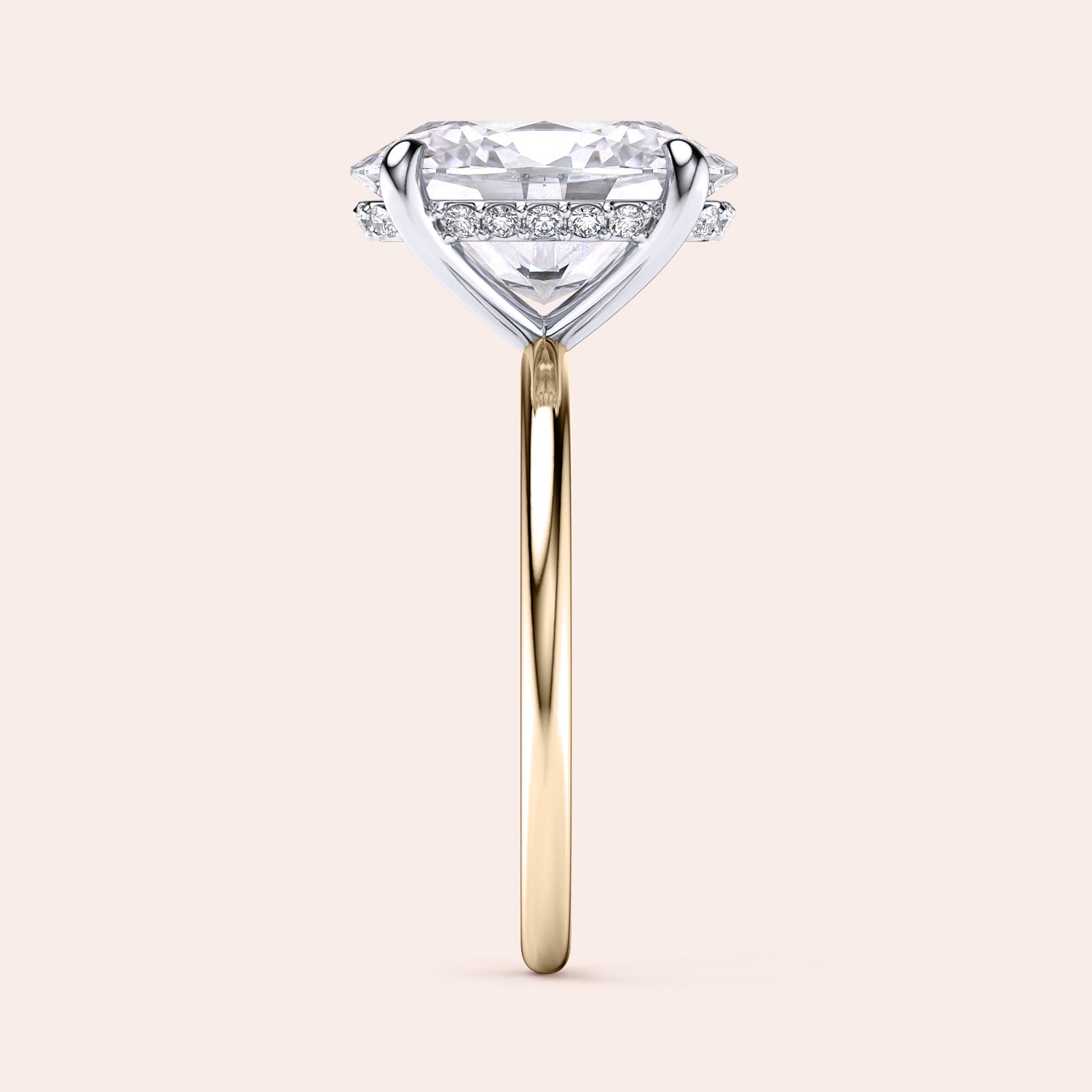 Two-tone 14K/18K gold engagement ring featuring an oval-cut diamond in a secret halo setting, blending white and yellow gold. |
#14KRecycledYellow/WhiteGold
#18KRecycledYellow/WhiteGold