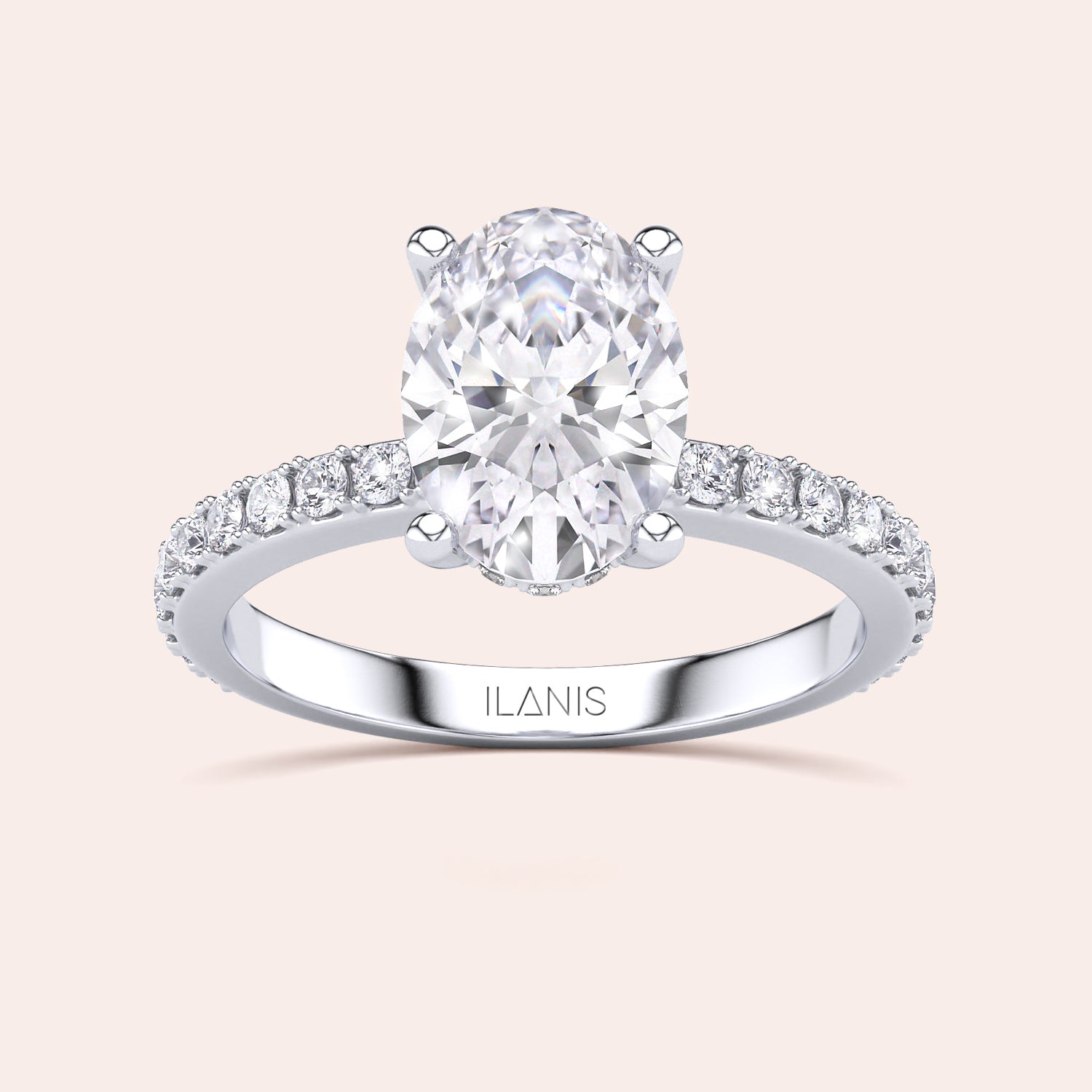 Elegant oval diamond engagement ring in 14K/18K gold or platinum, adorned with a delicate row of smaller diamonds on the band.|
#14KRecycledWhiteGold
#18KRecycledWhiteGold
#Platinum