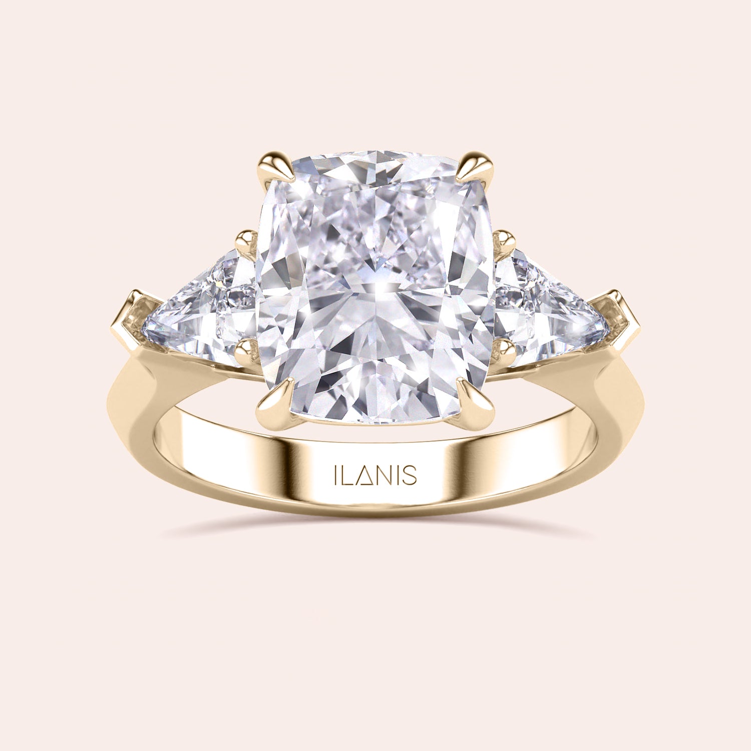 Elegant yellow gold 14K three stone engagement ring featuring a cushion diamond and shield side stones. |
#14KRecycledYellowGold
#18KRecycledYellowGold