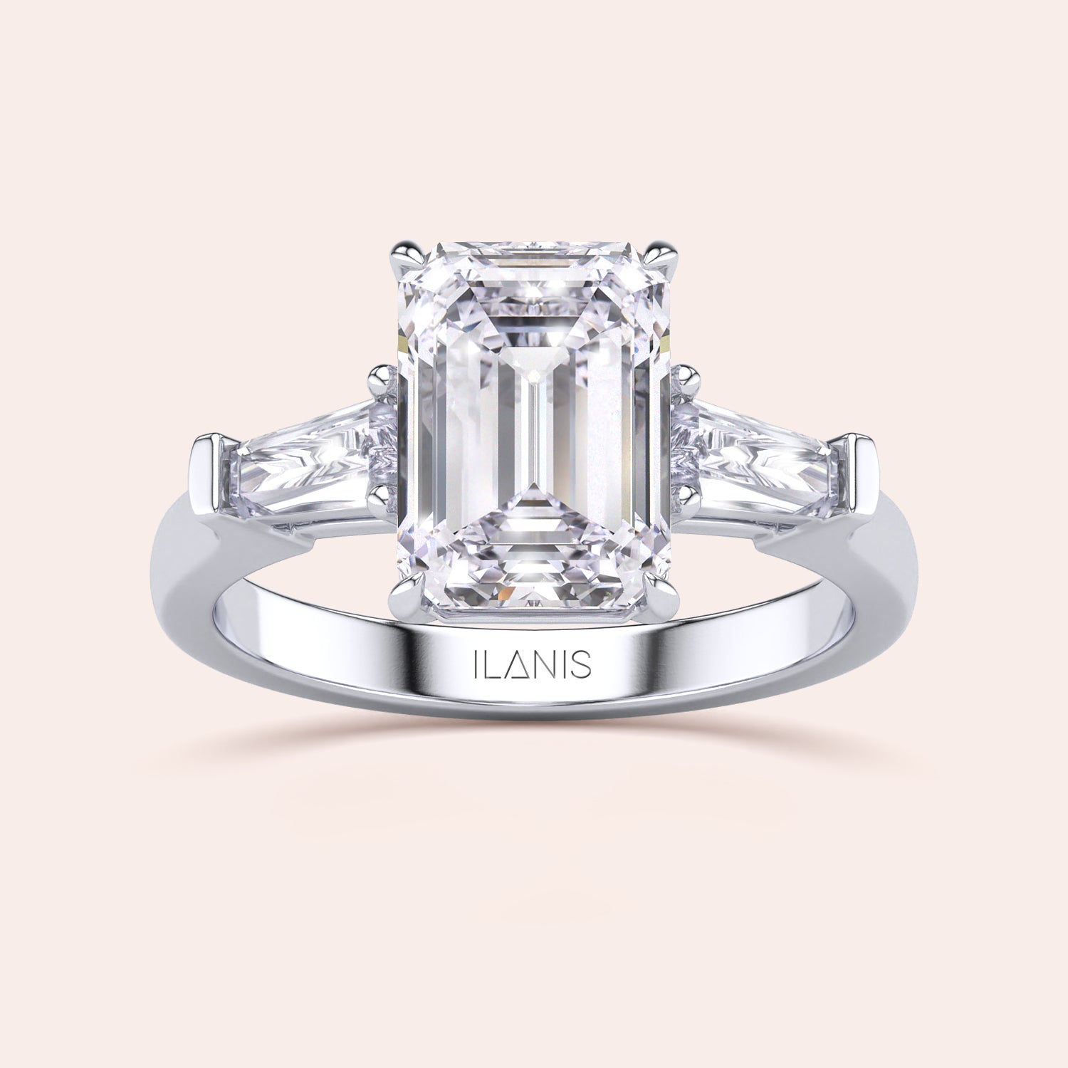 Minimalist yet stunning white gold engagement ring with a large emerald-cut center diamond, highlighted by its clean and simple design. | #14KRecycledWhiteGold #18KRecycledWhiteGold #Platinum