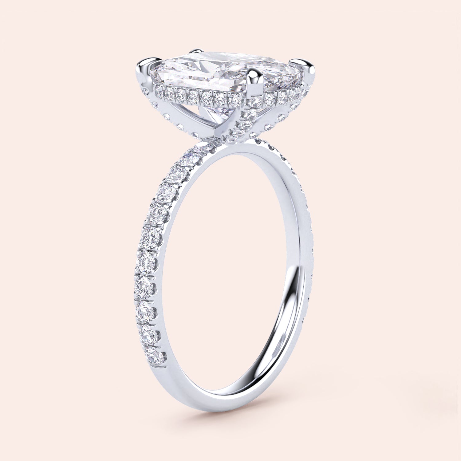 "Elegant 14K/18K white gold engagement ring with an elongated cushion-cut diamond and sparklingPave diamonds for added glamour."|
#14KRecycledWhiteGold
#18KRecycledWhiteGold
#Platinum