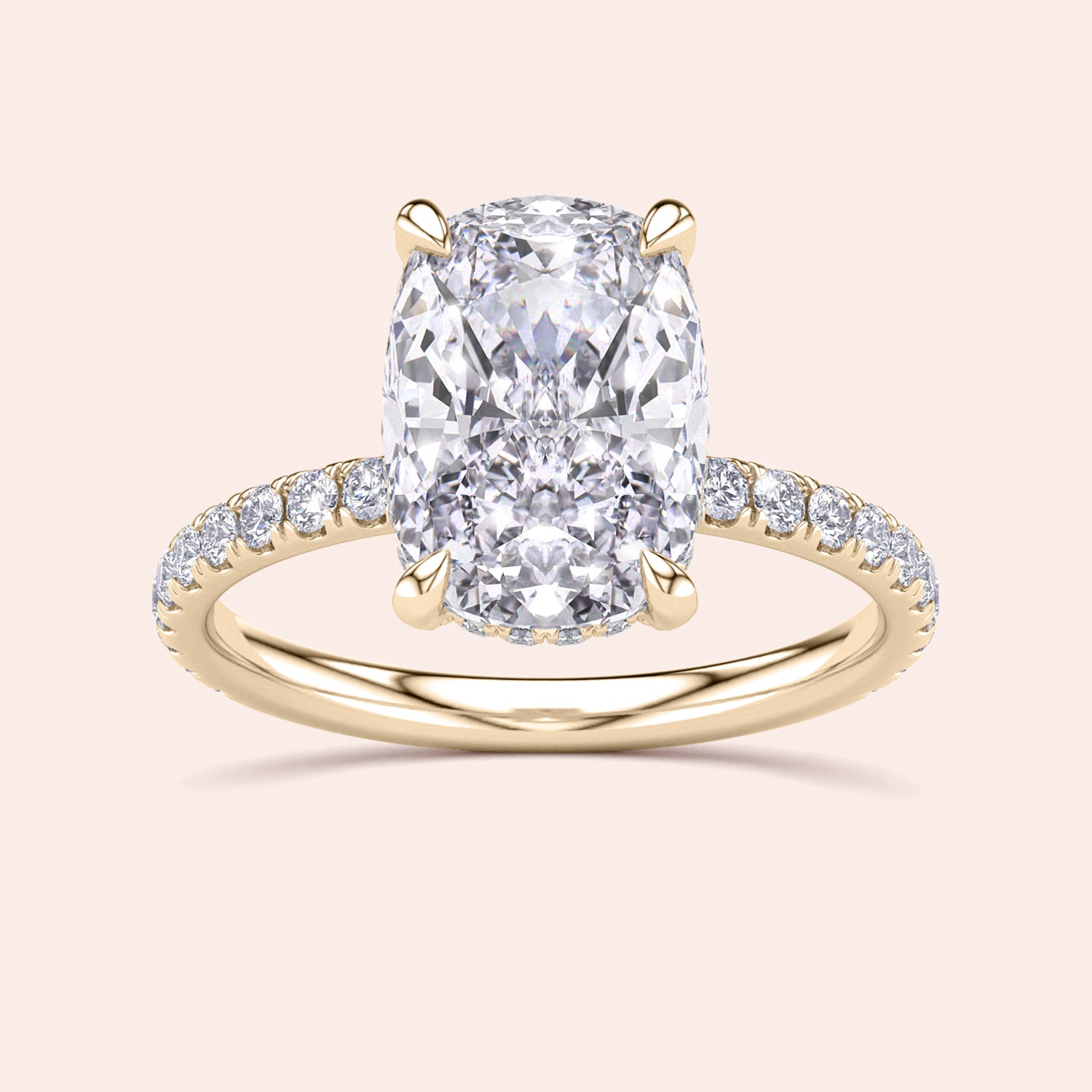 Elegant 14K yellow gold cushion-cut diamond engagement ring with a pave band, adorned with round brilliant diamonds.|
#14KRecycledYellowGold
#18KRecycledYellowGold