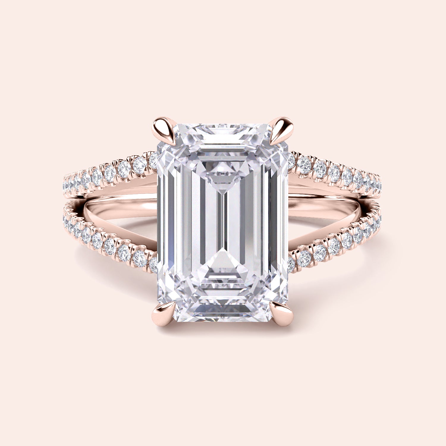 Emerald-cut diamond engagement ring in 14K rose gold, featuring a split shank, hidden halo, and round diamond accents.|
#14KRecycledRoseGold
#18KRecycledRoseGold