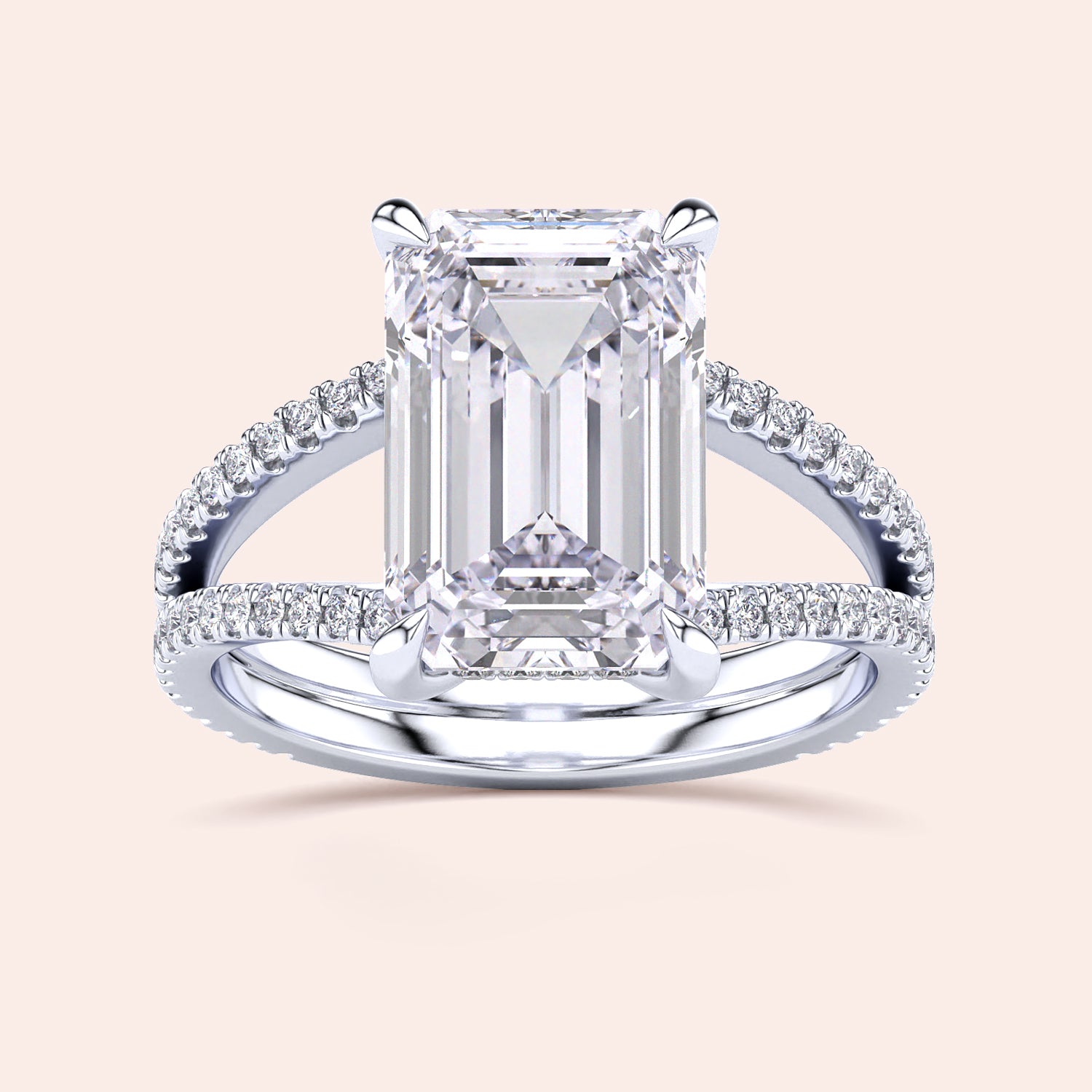 Emerald-cut diamond engagement ring withPave band in 14K or 18K gold, featuring a split shank and hidden halo design.|
#14KRecycledWhiteGold
#18KRecycledWhiteGold
#Platinum