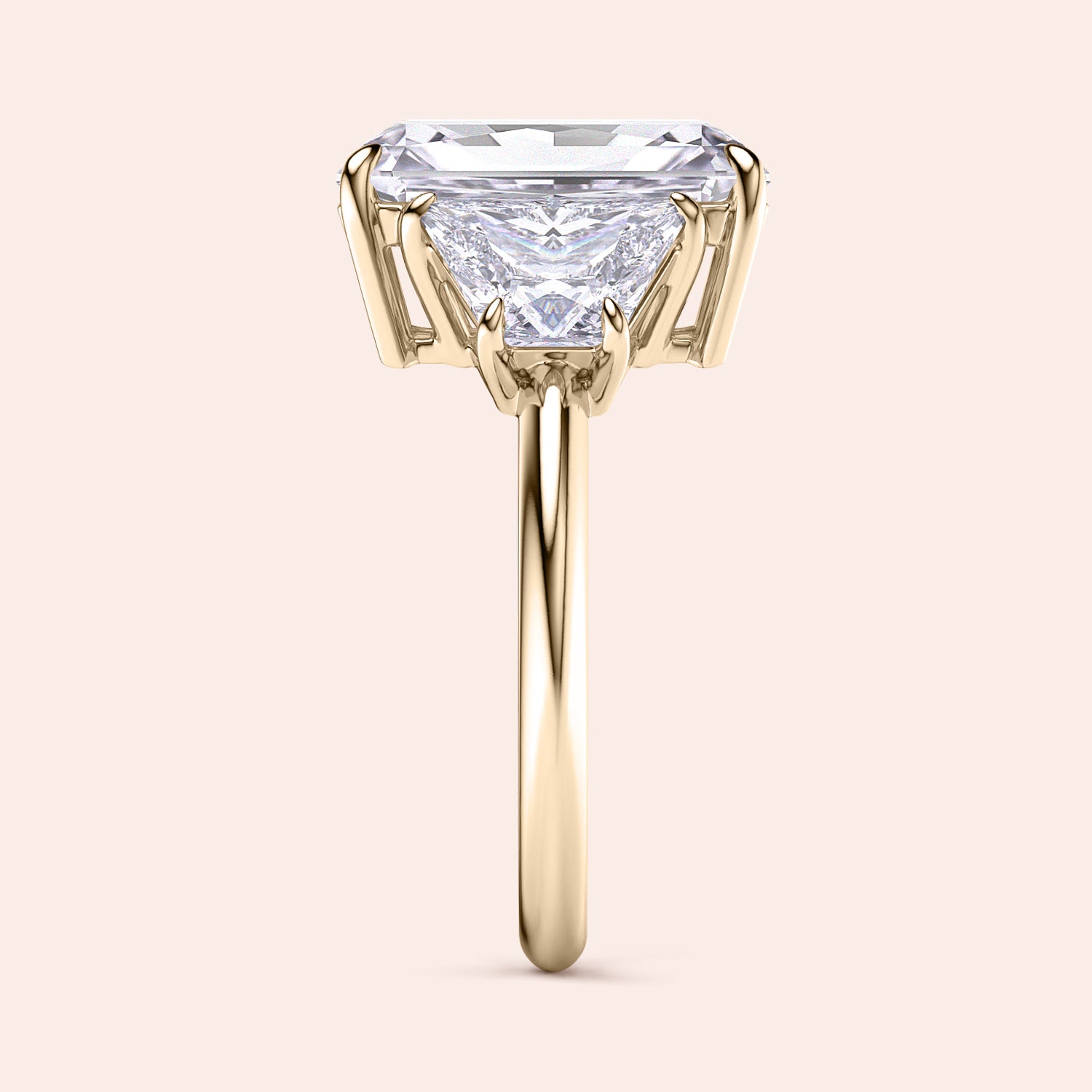 Elegant 14K gold engagement ring featuring a dazzling trapezoid diamond, showcasing timeless beauty and sophistication.|
#14KRecycledYellowGold
#18KRecycledYellowGold