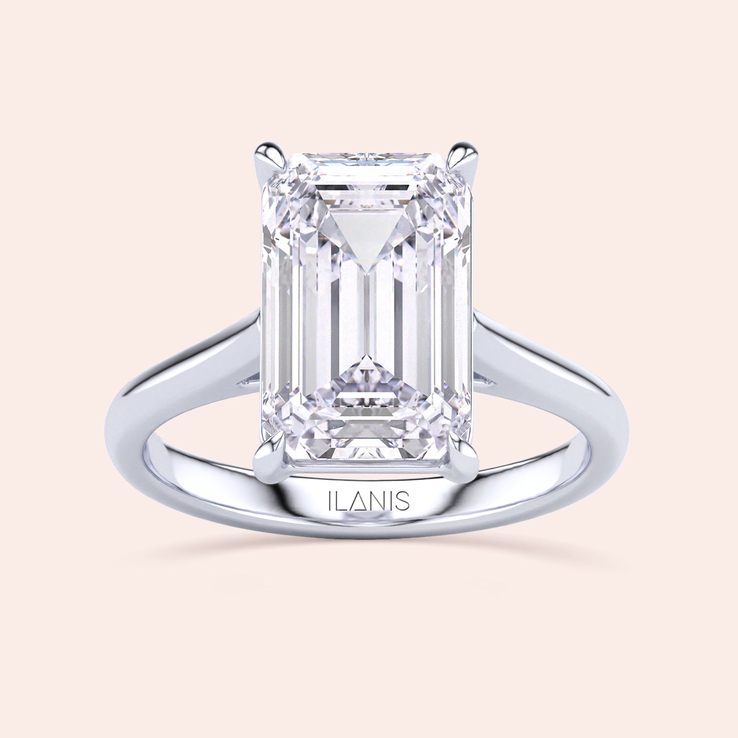 Stunning emerald-cut diamond engagement ring in 14K/18K gold or platinum, by ILANIS, featuring a sleek cathedral setting.|
#14KRecycledWhiteGold
#18KRecycledWhiteGold
#Platinum