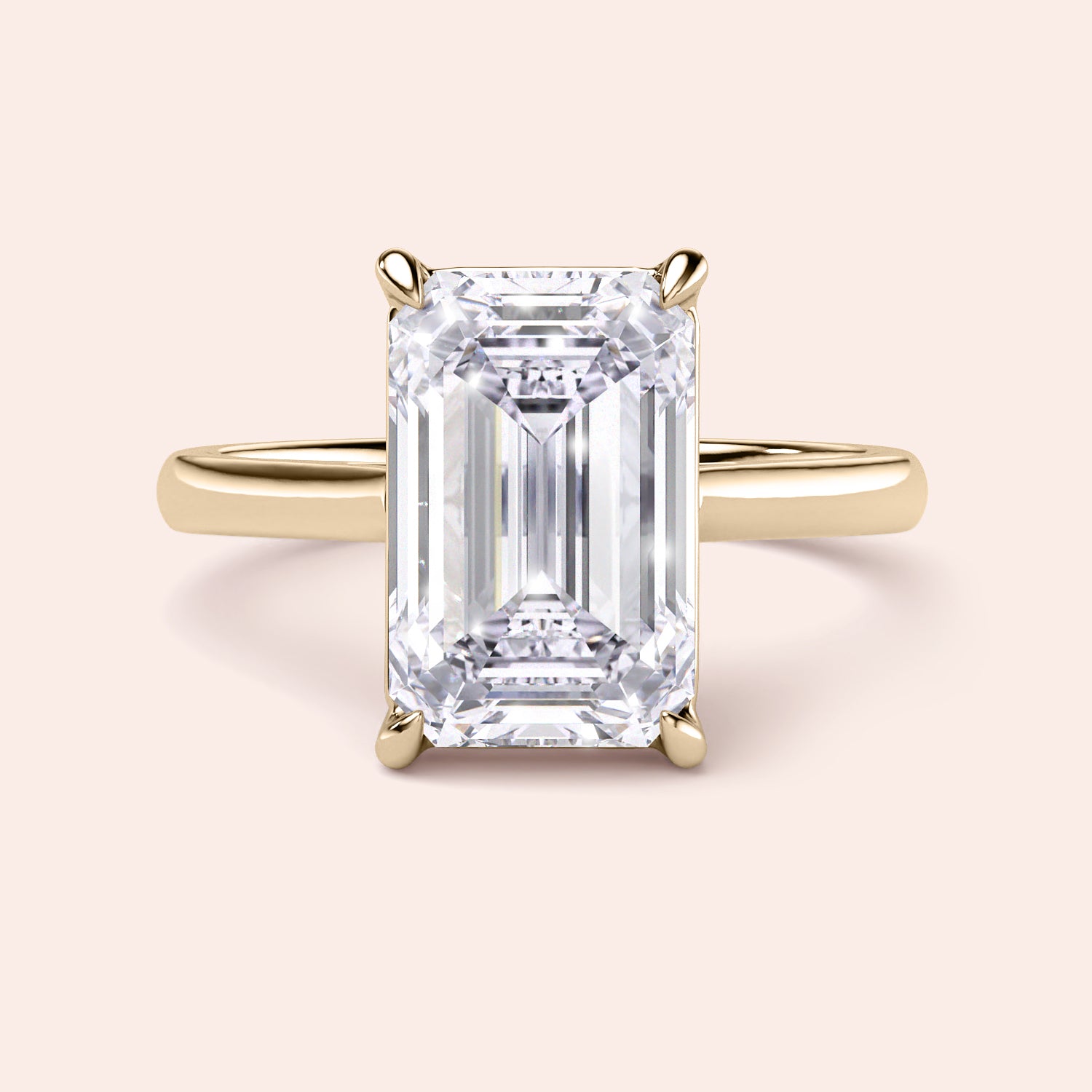 Elegant emerald cut engagement ring in 14K or 18K yellow gold or platinum, showcasing timeless sophistication.|
#14KRecycledYellowGold
#18KRecycledYellowGold