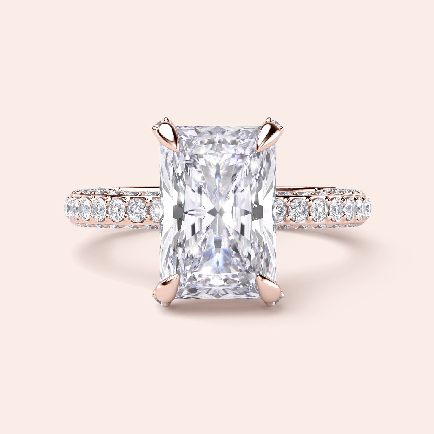 Radiant cut diamond engagement ring in 14K rose gold with pave band, perfect for timeless elegance and sparkle.|
#14KRecycledRoseGold
#18KRecycledRoseGold