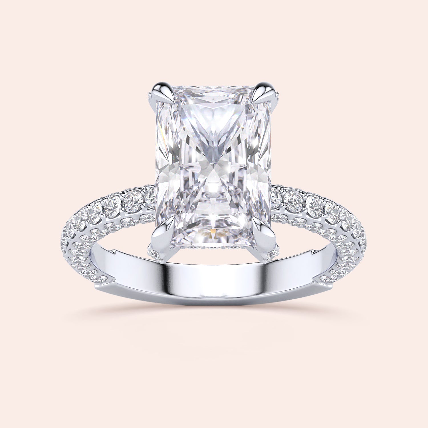 Radiant-cut diamond engagement ring in 14K or 18K white gold, showcasing a stunning pave diamond band detail.|
#14KRecycledWhiteGold
#18KRecycledWhiteGold
#Platinum