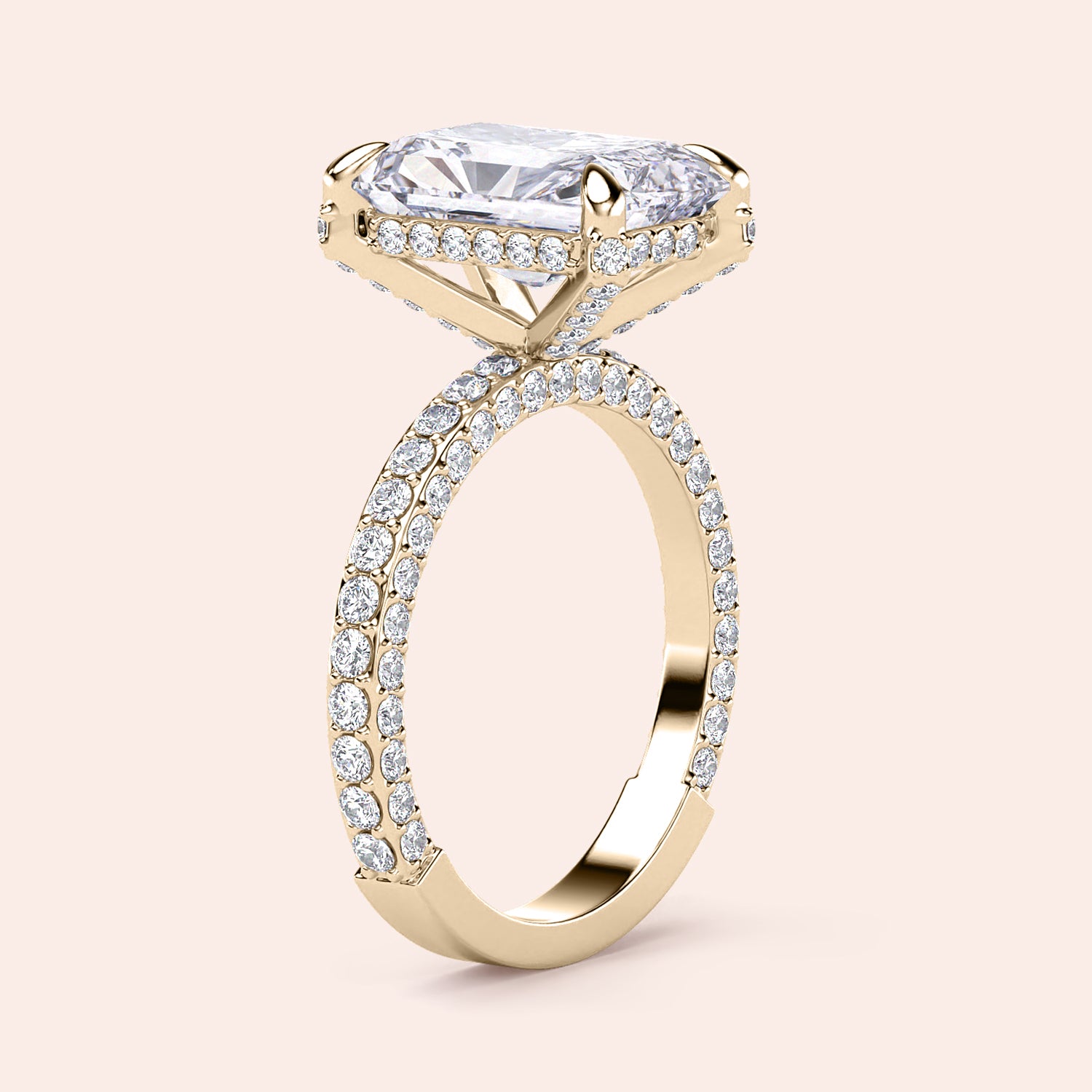 Elegant 14K or 18K gold ring with radiant elongated cushion-cut diamond and pave band, perfect for engagement.|
#14KRecycledYellowGold
#18KRecycledYellowGold