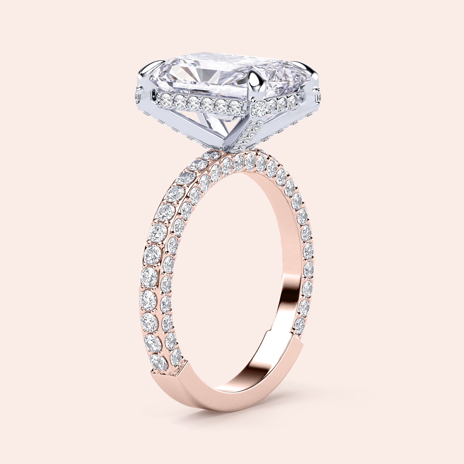 Two-tone 14K white and rose gold diamond ring featuring an emerald-cut stone, perfect for stylish weddings or engagements. |
#14KRecycledRose/WhiteGold
#18KRecycledRose/WhiteGold