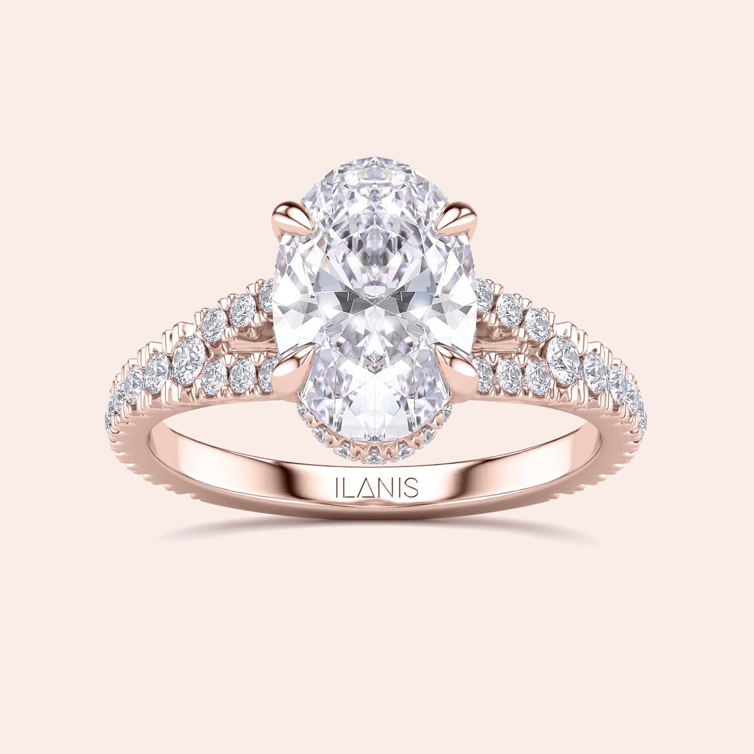 Elegant oval-cut diamond engagement ring in 14K rose gold, featuring a stunning round diamond-studded band for timeless beauty.|
#14KRecycledRoseGold
#18KRecycledRoseGold