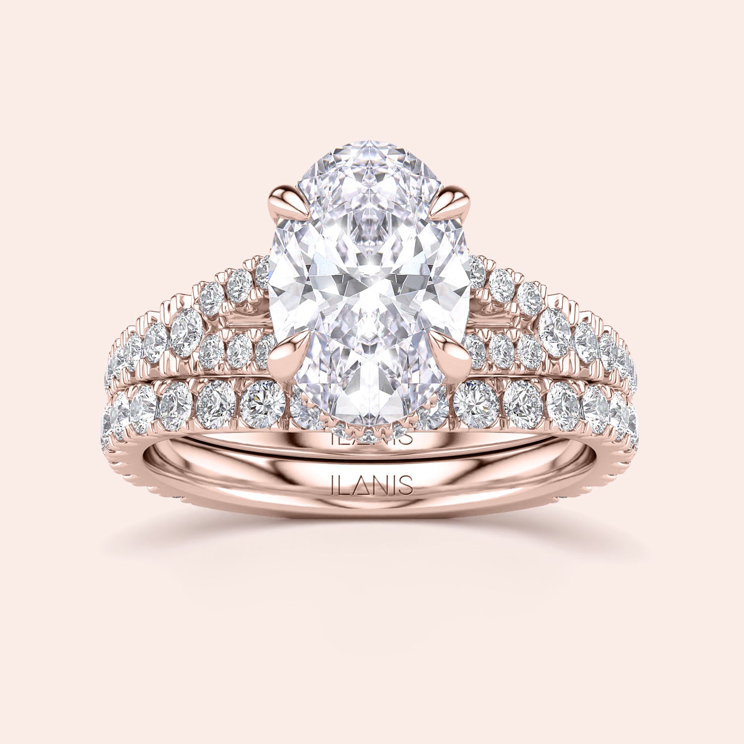 Rose gold bridal set with oval diamond center and round diamonds, available in 14K, 18K, or platinum. Elegant engagement ring design.|
#14KRecycledRoseGold
#18KRecycledRoseGold