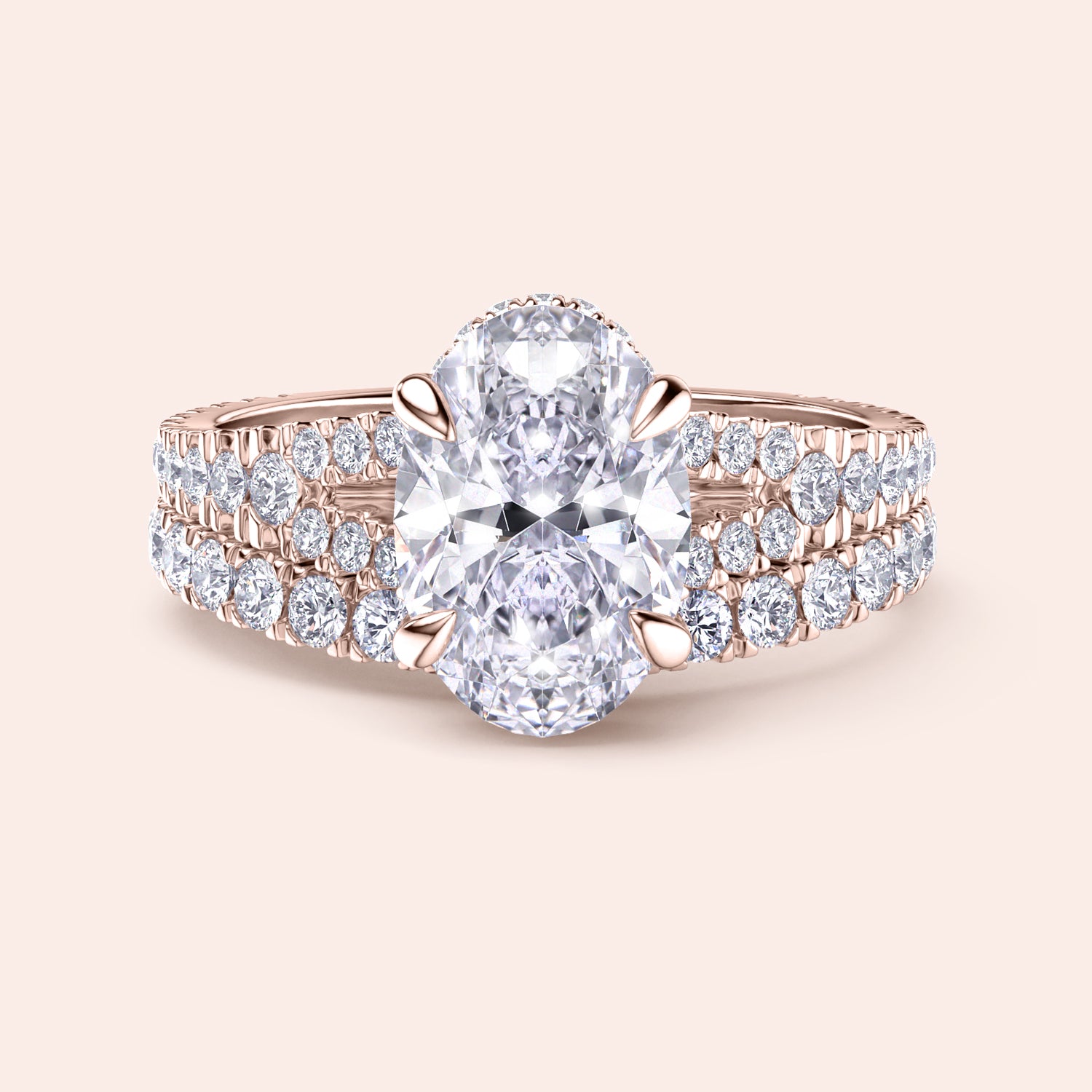 Elegant oval-shaped diamond engagement ring with halo, in 14K or 18K gold or platinum, featuring a double-band shank with pave diamonds.|
#14KRecycledRoseGold
#18KRecycledRoseGold