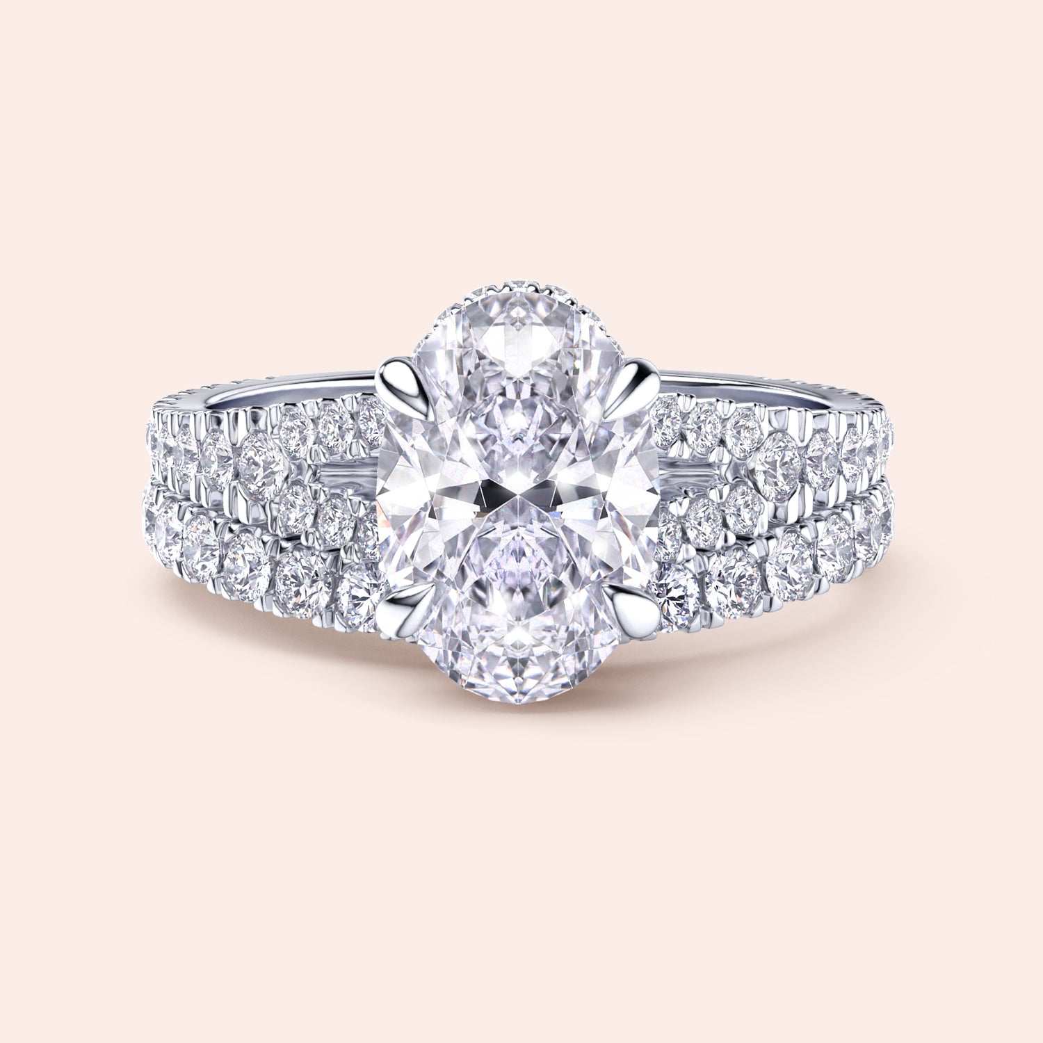 Elegant 14K white gold oval diamond engagement ring with split shank and pave-set diamonds, perfect for timeless romance.|
#14KRecycledWhiteGold
#18KRecycledWhiteGold
#Platinum