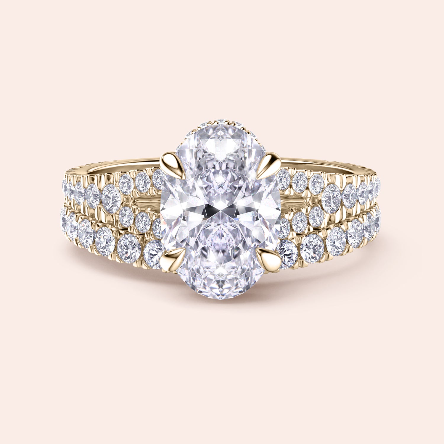 Stunning yellow gold oval diamond engagement ring with doublePave band, featuring brilliant diamond and four-prong setting.|
#14KRecycledYellowGold
#18KRecycledYellowGold