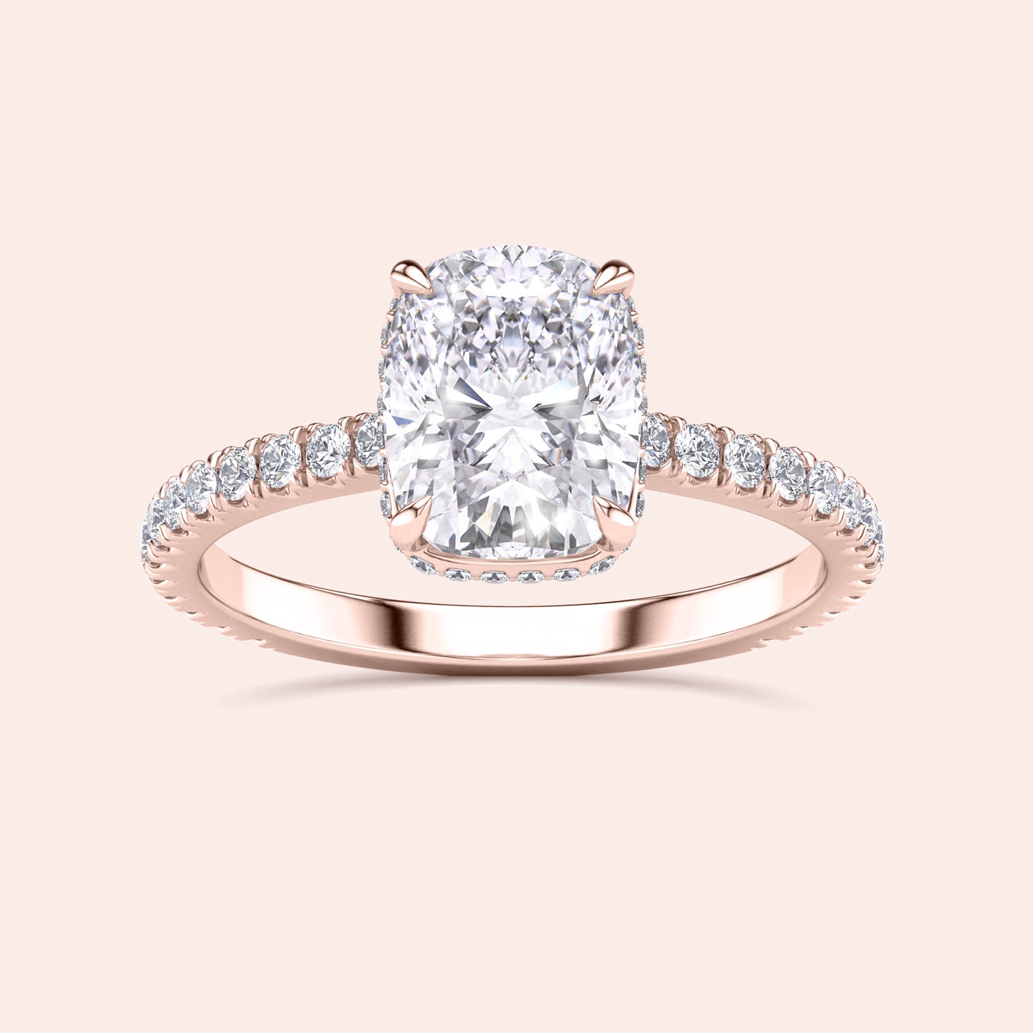 Elegant rose gold engagement ring featuring cushion cut diamond center stone and pave-set diamonds, available in 14K, 18K, or platinum.|
#14KRecycledRoseGold
#18KRecycledRoseGold