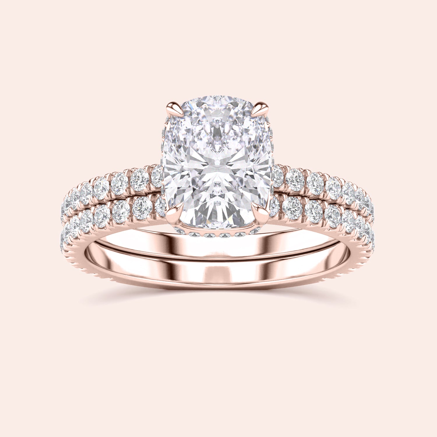 Elegant rose gold diamond ring set with cushion-cut centerpiece and accent diamonds, available in 14K, 18K, or platinum options.|
#14KRecycledRoseGold
#18KRecycledRoseGold
