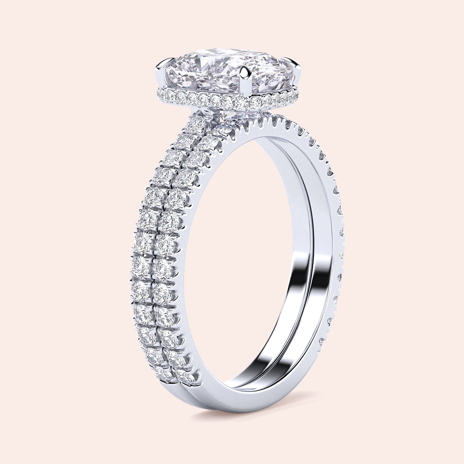 Elegant 14K and 18K gold or platinum engagement ring with a stunning oval diamond and smaller diamonds adorning the band.|
#14KRecycledWhiteGold
#18KRecycledWhiteGold
#Platinum