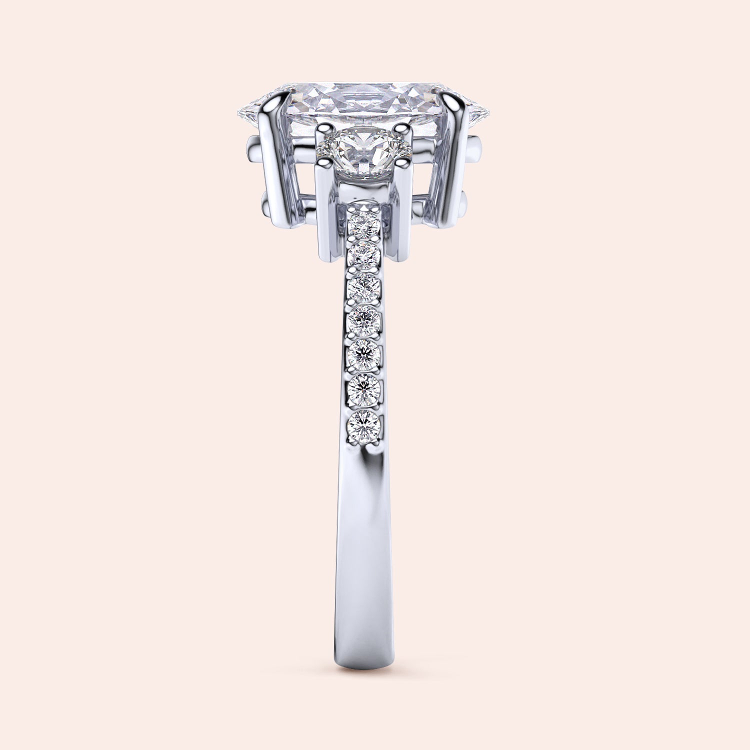 Marquise-shaped diamond engagement ring in 14K or 18K gold or platinum, featuring smaller diamonds on the band for added elegance.|
#14KRecycledWhiteGold
#18KRecycledWhiteGold
#Platinum