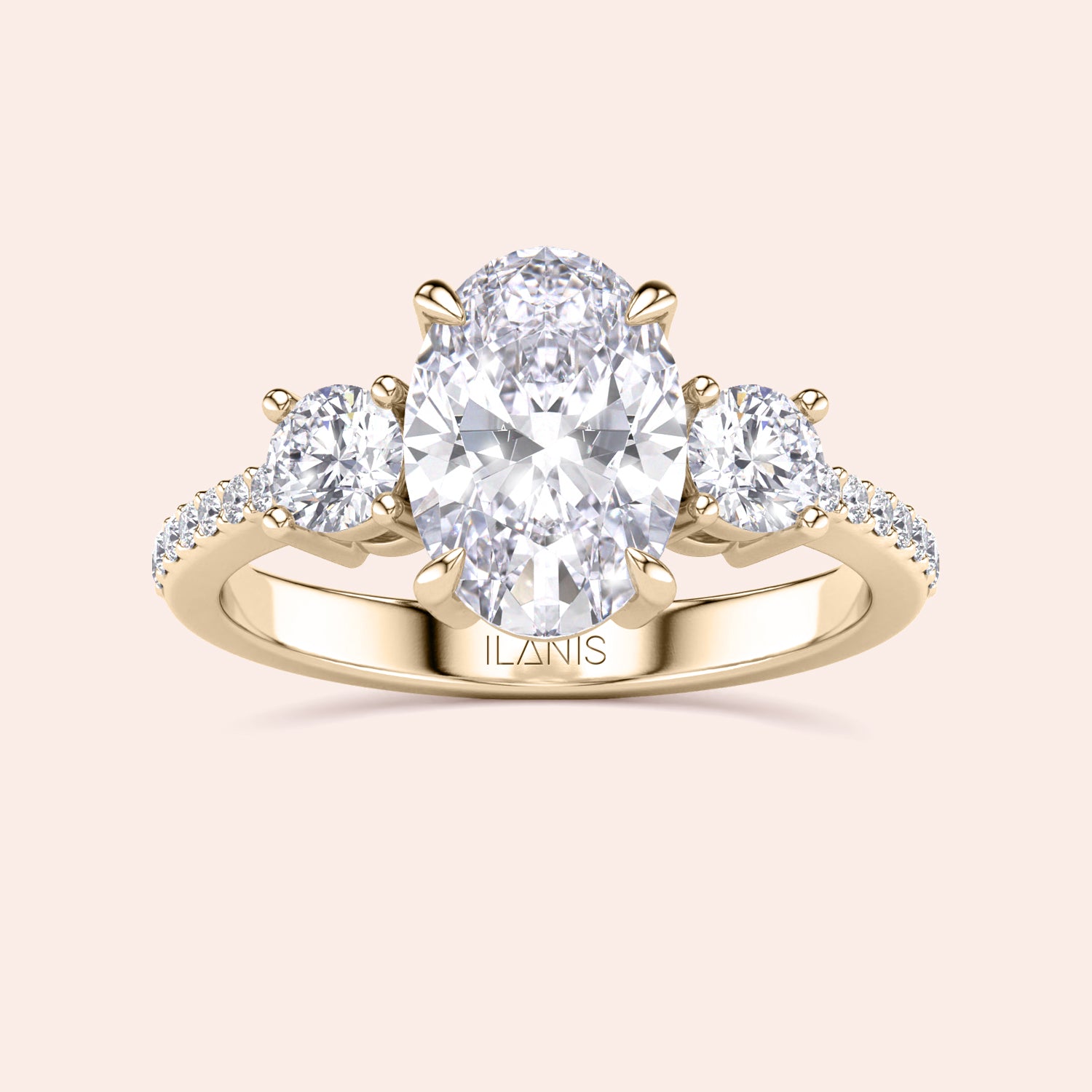 Three-stone oval engagement ring with diamond center stone in 14K or 18K gold, featuring pave side stones for added sparkle.|
#14KRecycledYellowGold
#18KRecycledYellowGold