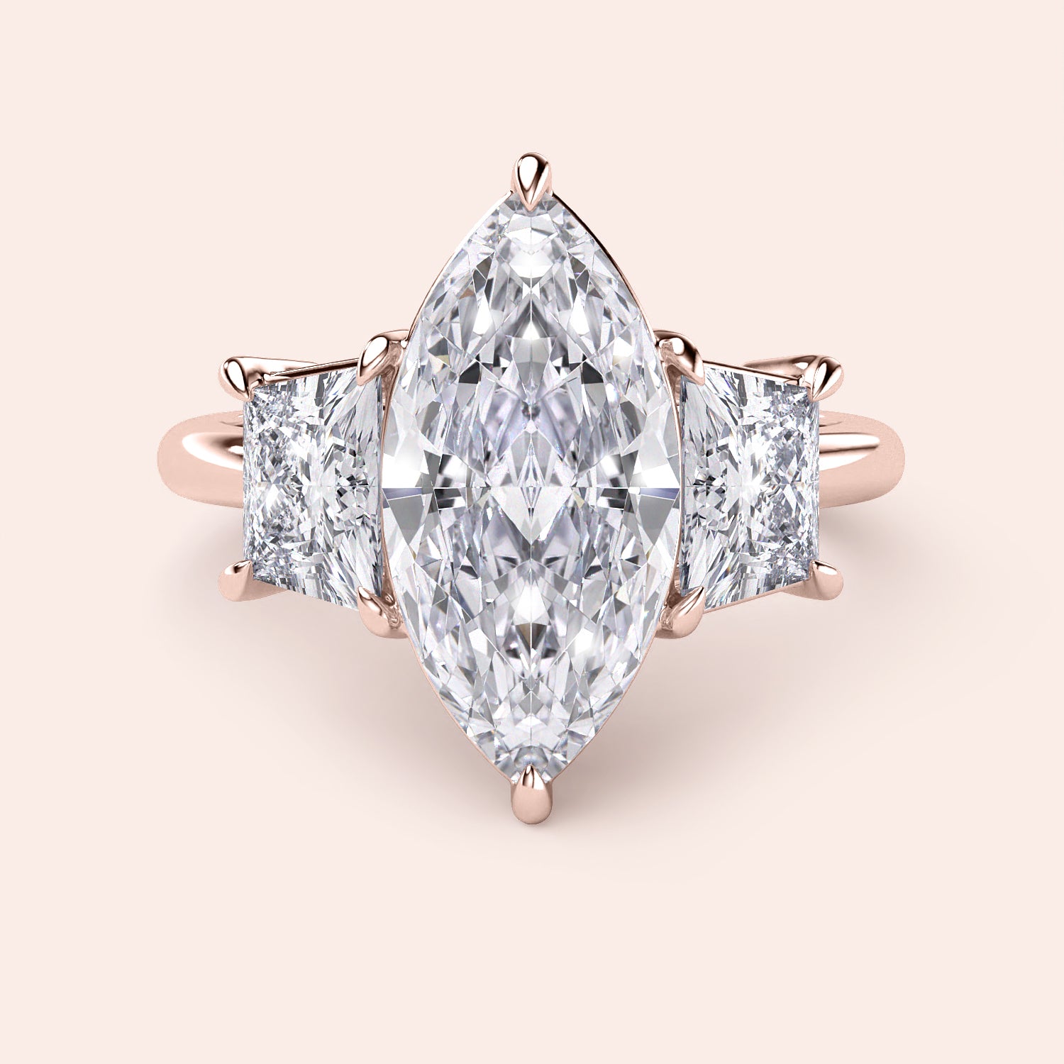Exquisite three-stone engagement ring in 14K or 18K rose gold, featuring marquise and square-cut diamonds for a stunning look.|
#14KRecycledRoseGold
#18KRecycledRoseGold