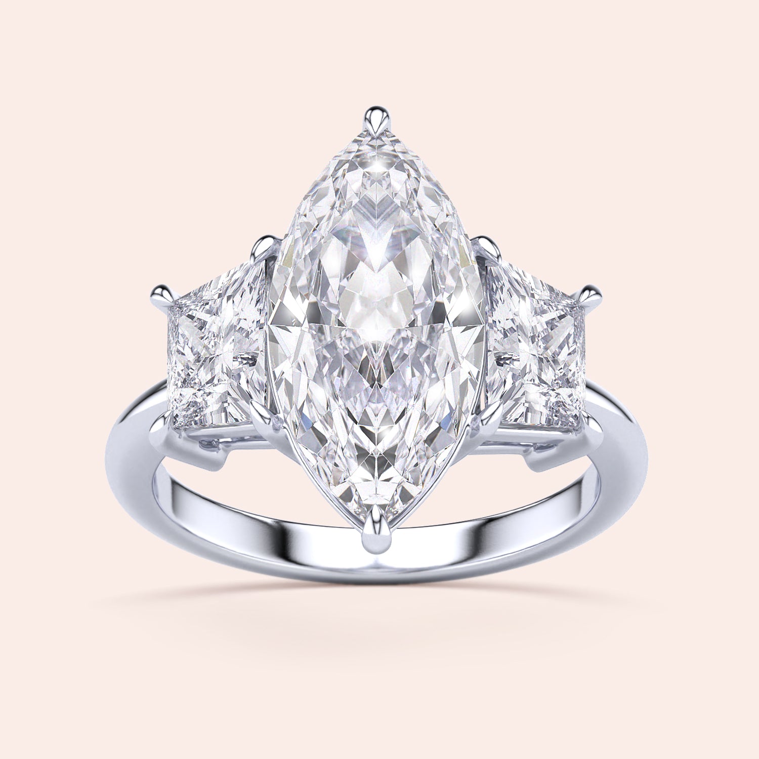 Elegant marquise cut diamond engagement ring with side diamonds in 14K/18K gold or platinum, shining brilliantly against light.|
#14KRecycledWhiteGold
#18KRecycledWhiteGold
#Platinum
