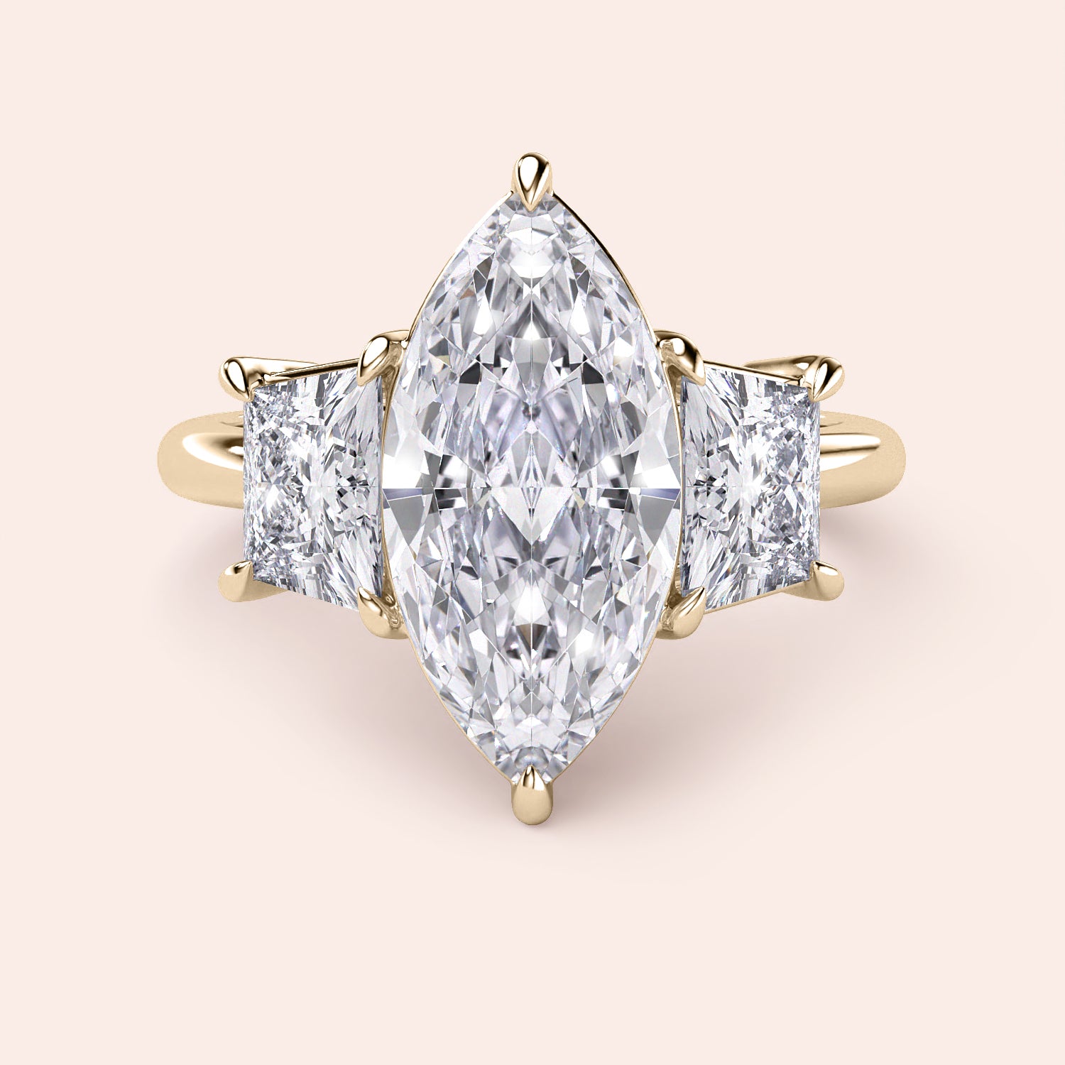 Elegant 14K yellow gold engagement ring with marquise diamond and two princess-cut diamonds for a stunning sparkle.|
#14KRecycledYellowGold
#18KRecycledYellowGold