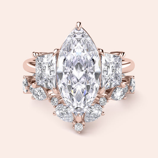 Elegant emerald-cut diamond engagement ring in 14K rose gold, worn on model, featuring a stunning pave band for a timeless look.