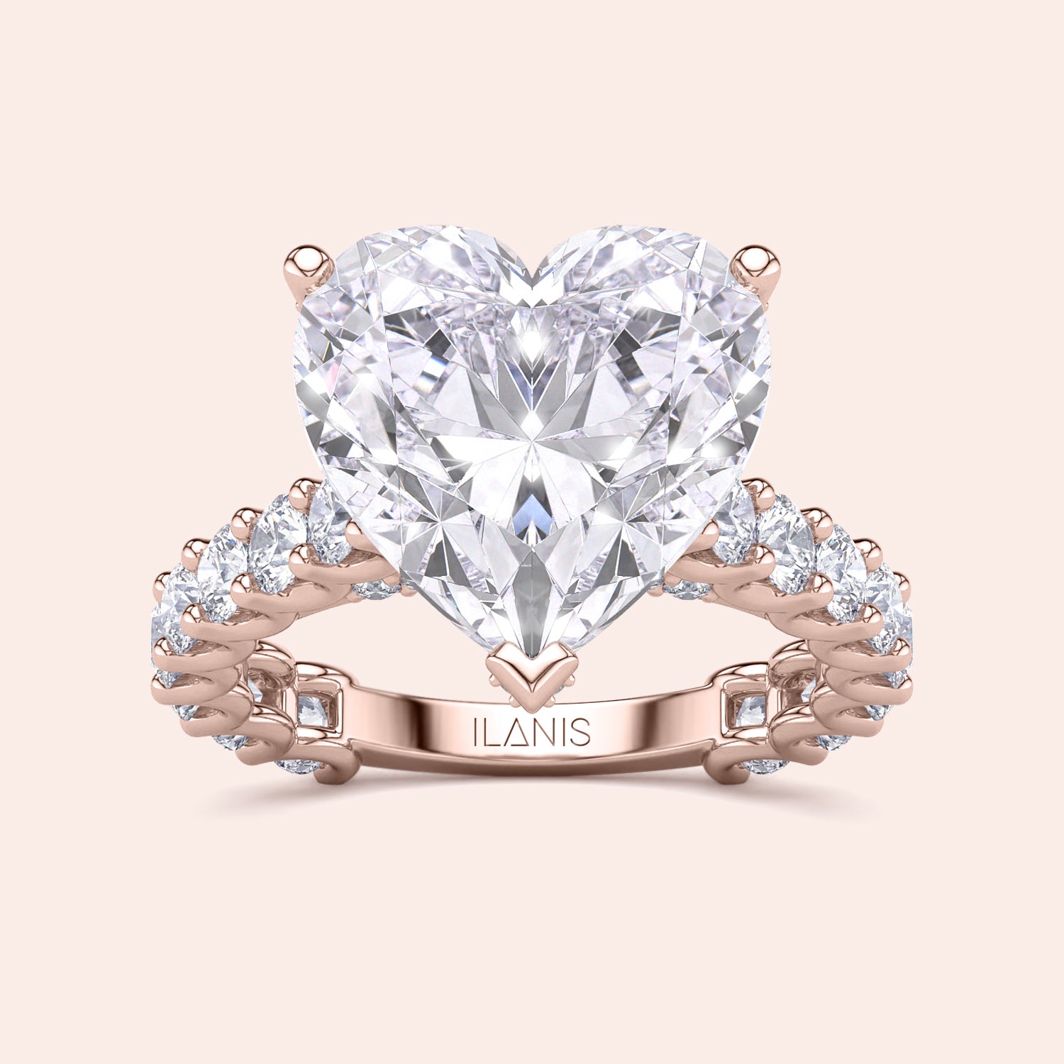 Heart-shaped diamond engagement ring in rose gold, featuring a halo of diamonds. Available in 14K, 18K, or platinum.|
#14KRecycledRoseGold
#18KRecycledRoseGold