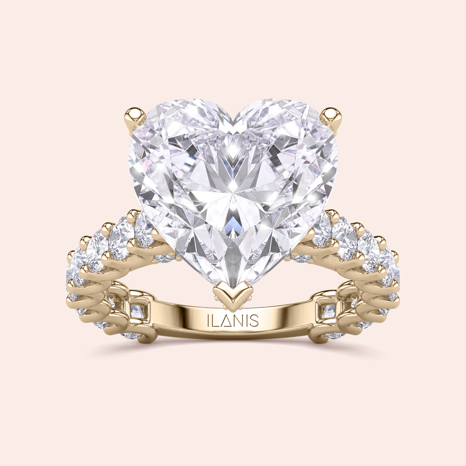 Elegant heart-shaped diamond engagement ring with 14K gold band, featuring a central heart-cut diamond and diamond accents.|
#14KRecycledYellowGold
#18KRecycledYellowGold