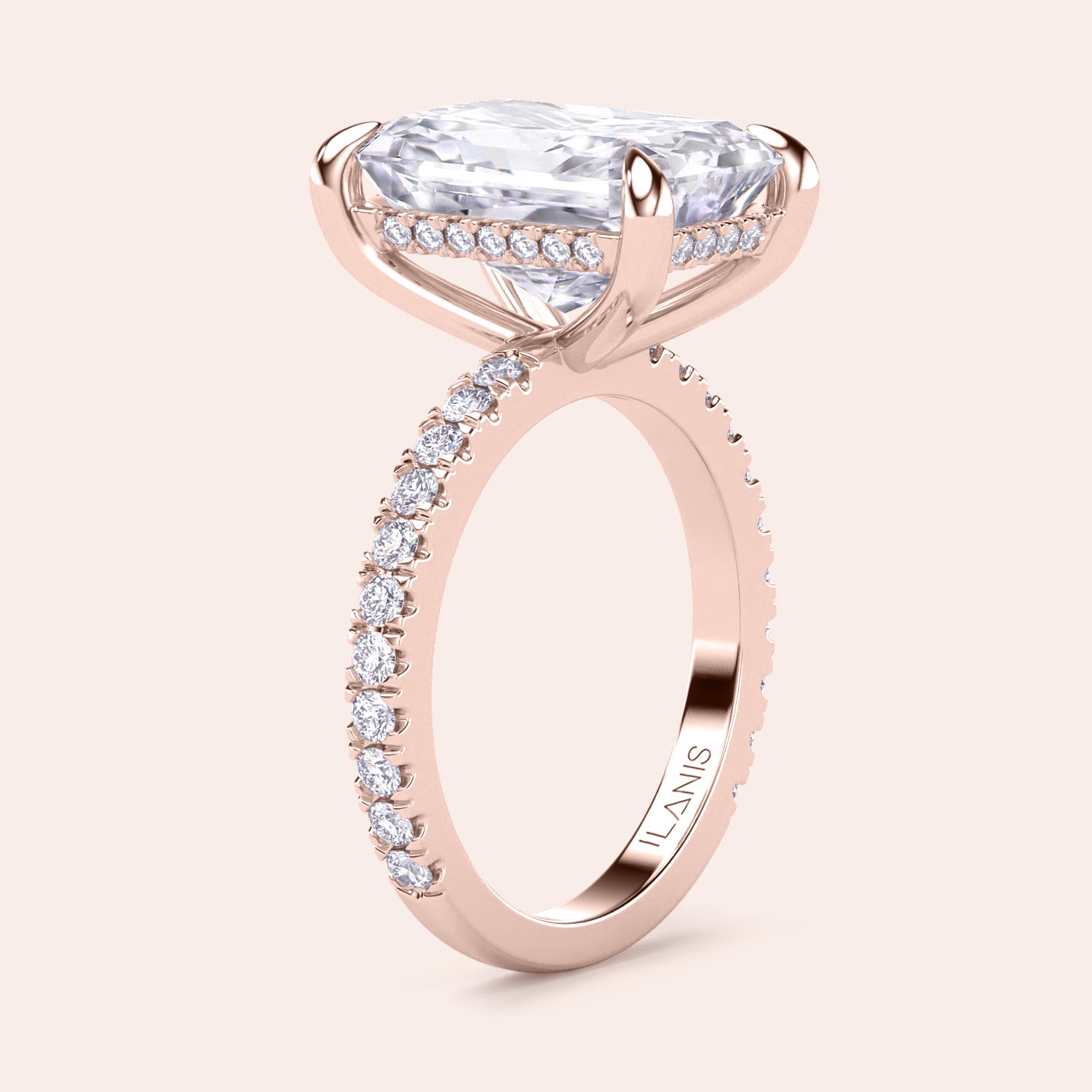 Elegant 14K rose gold engagement ring featuring a radiant-cut diamond and sparklingPave band. Not worn on model.|
#14KRecycledRoseGold
#18KRecycledRoseGold