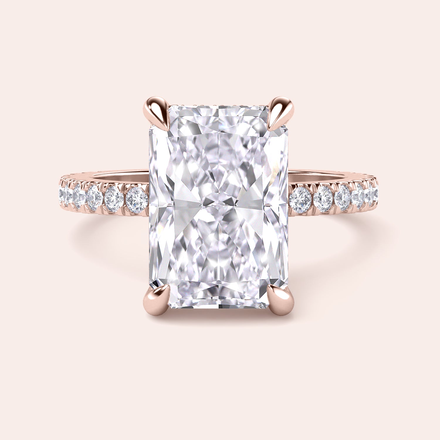 Radiant cut diamond engagement ring in 14K rose gold with pave band, perfect for timeless elegance and sparkle.|
#14KRecycledRoseGold
#18KRecycledRoseGold