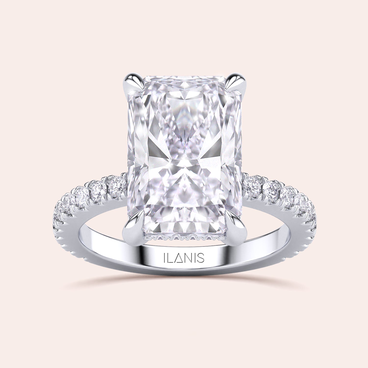 Radiant-cut diamond engagement ring in 14K or 18K white gold, showcasing a stunning pave diamond band detail.|
#14KRecycledWhiteGold
#18KRecycledWhiteGold
#Platinum