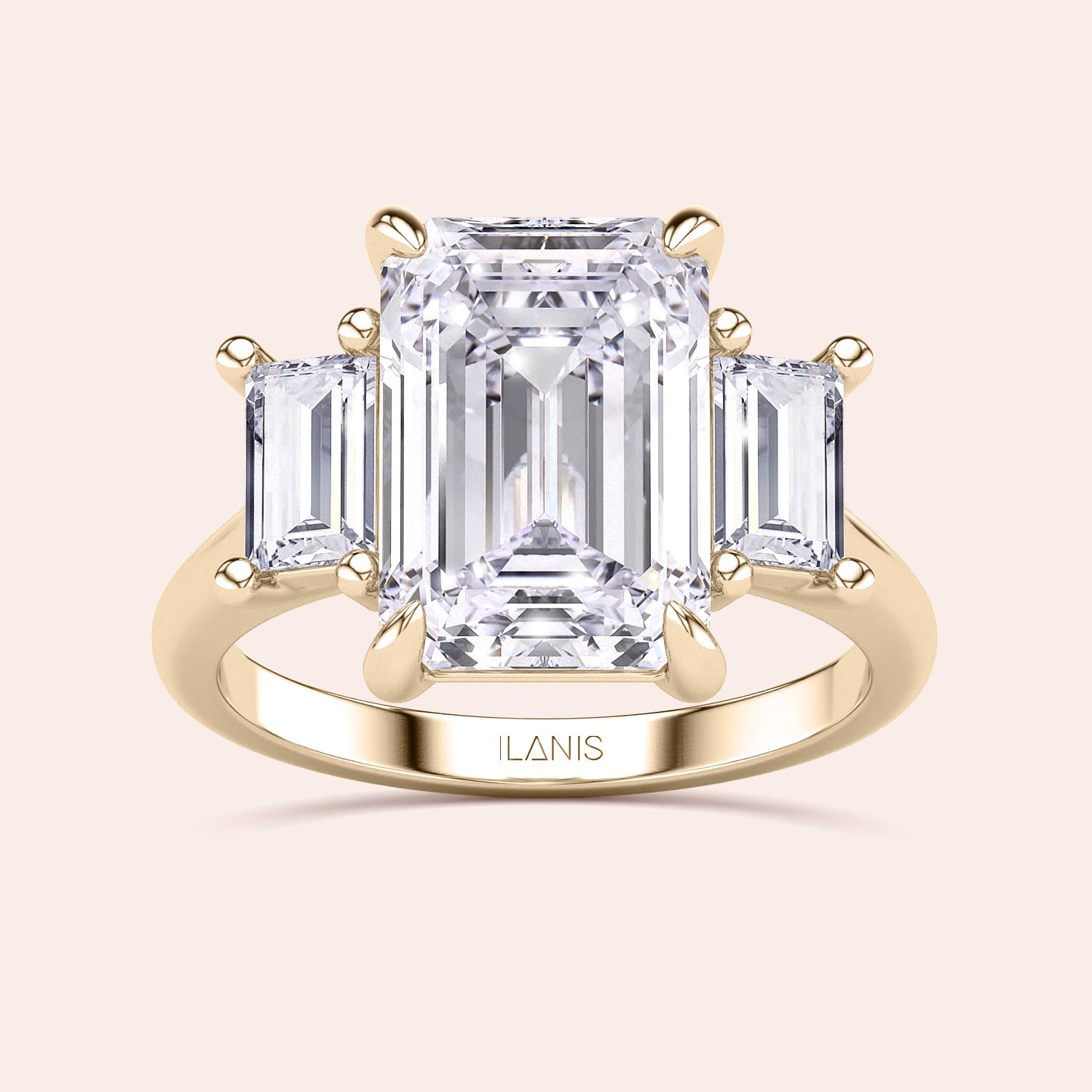 Radiant-cut diamond engagement ring with side stone accents in 14K yellow gold, displayed on a neutral background.|
#14KRecycledYellowGold
#18KRecycledYellowGold
