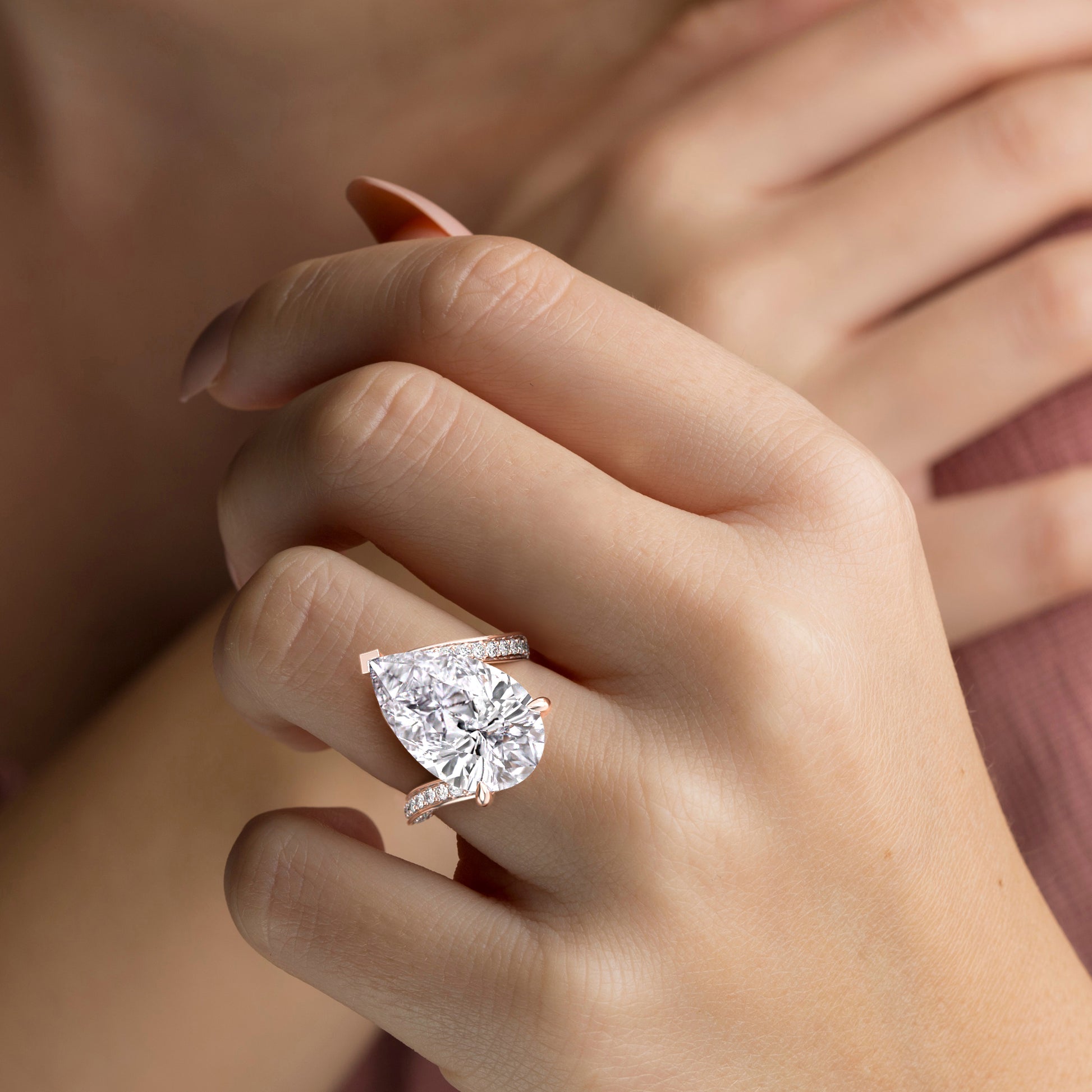 Rose Gold pear-shaped diamond engagement ring with Pave band, available in 14K/18K gold or platinum, features an exquisite centerpiece.|
#14KRecycledRoseGold
#18KRecycledRoseGold