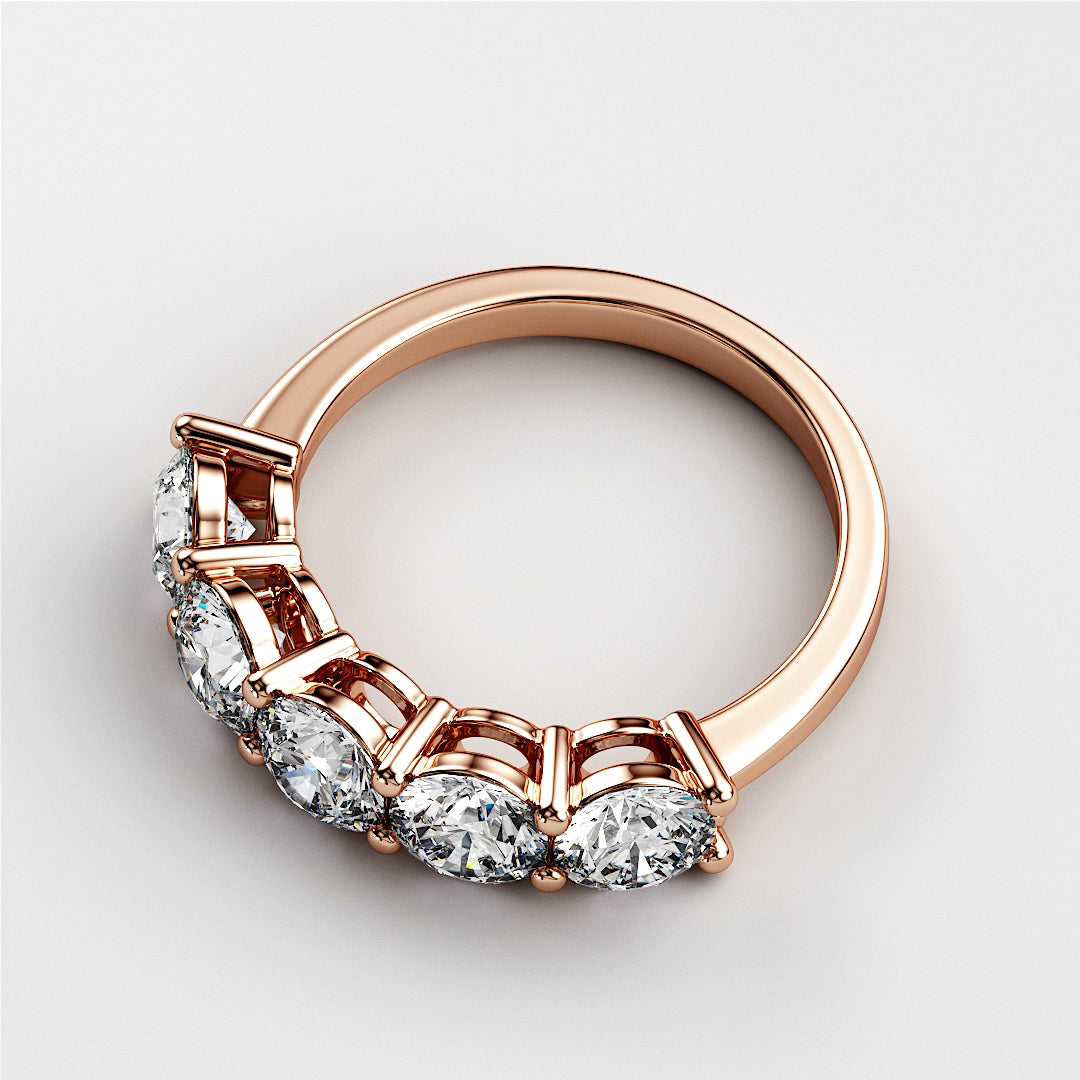 Rose gold wedding band featuring five round brilliant-cut diamonds in prong setting, available in 14K, 18K, or platinum. |
 
 
 
 
 #14KRecycledRoseGold
 #18KRecycledRoseGold
