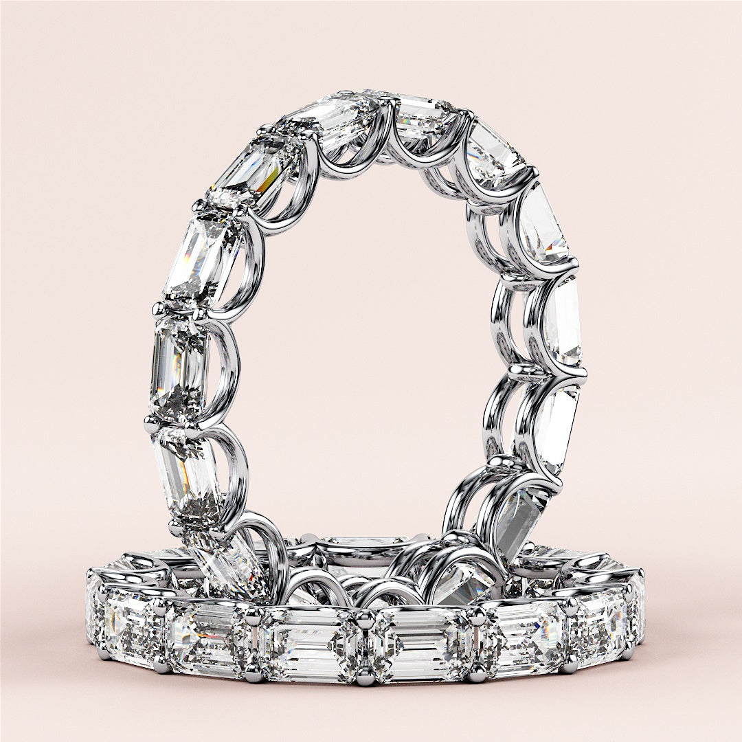 14K or 18K white gold eternity band featuring emerald-cut diamonds, elegantly displayed against a neutral background. |
 #14KRecycledWhiteGold
 #18KRecycledWhiteGold
 
 
 
 
 #Platinum