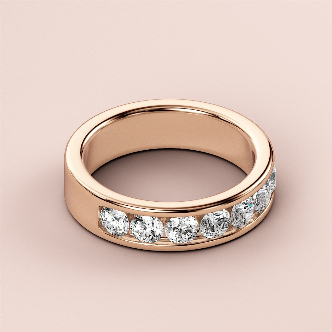 Luxurious 14K rose gold wedding band featuring round brilliant-cut diamonds in a channel design for timeless elegance. |
 
 
 
 
 #14KRecycledRoseGold
 #18KRecycledRoseGold