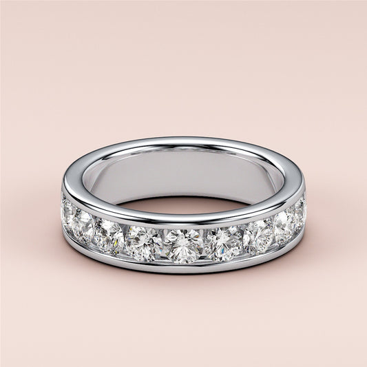 Luxurious 14K White Gold wedding band featuring a channel-set row of dazzling round diamonds for a contemporary, sophisticated look.