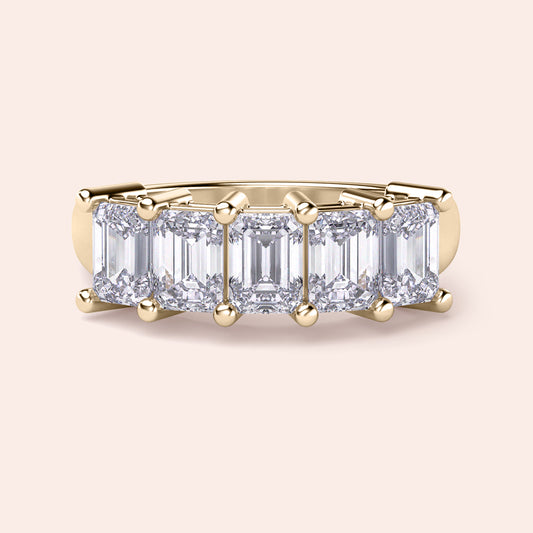 Stunning 14K Yellow Gold wedding band featuring a five-stone emerald-cut diamond design for a timeless and elegant look.