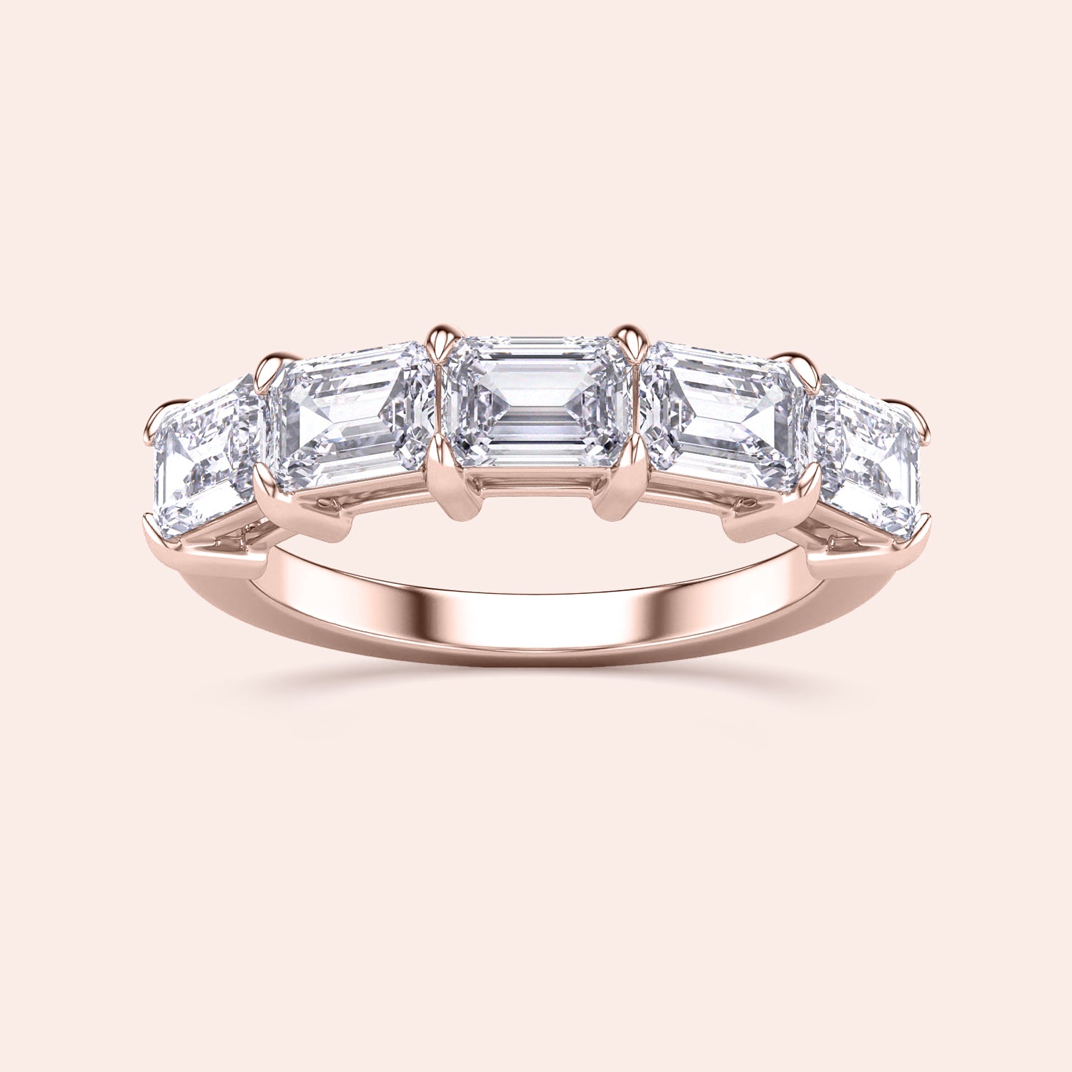 Elegant 14K or 18K rose gold wedding band featuring radiant emerald-cut diamonds in a five-stone design. |
 
 
 
 
 #14KRecycledRoseGold
 #18KRecycledRoseGold