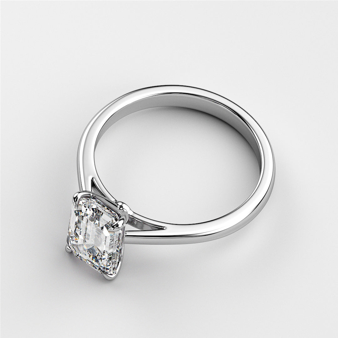 Elegant 14K or 18K white gold solitaire engagement ring featuring an asscher-cut diamond for timeless beauty.|
#14KRecycledWhiteGold
#18KRecycledWhiteGold
#Platinum