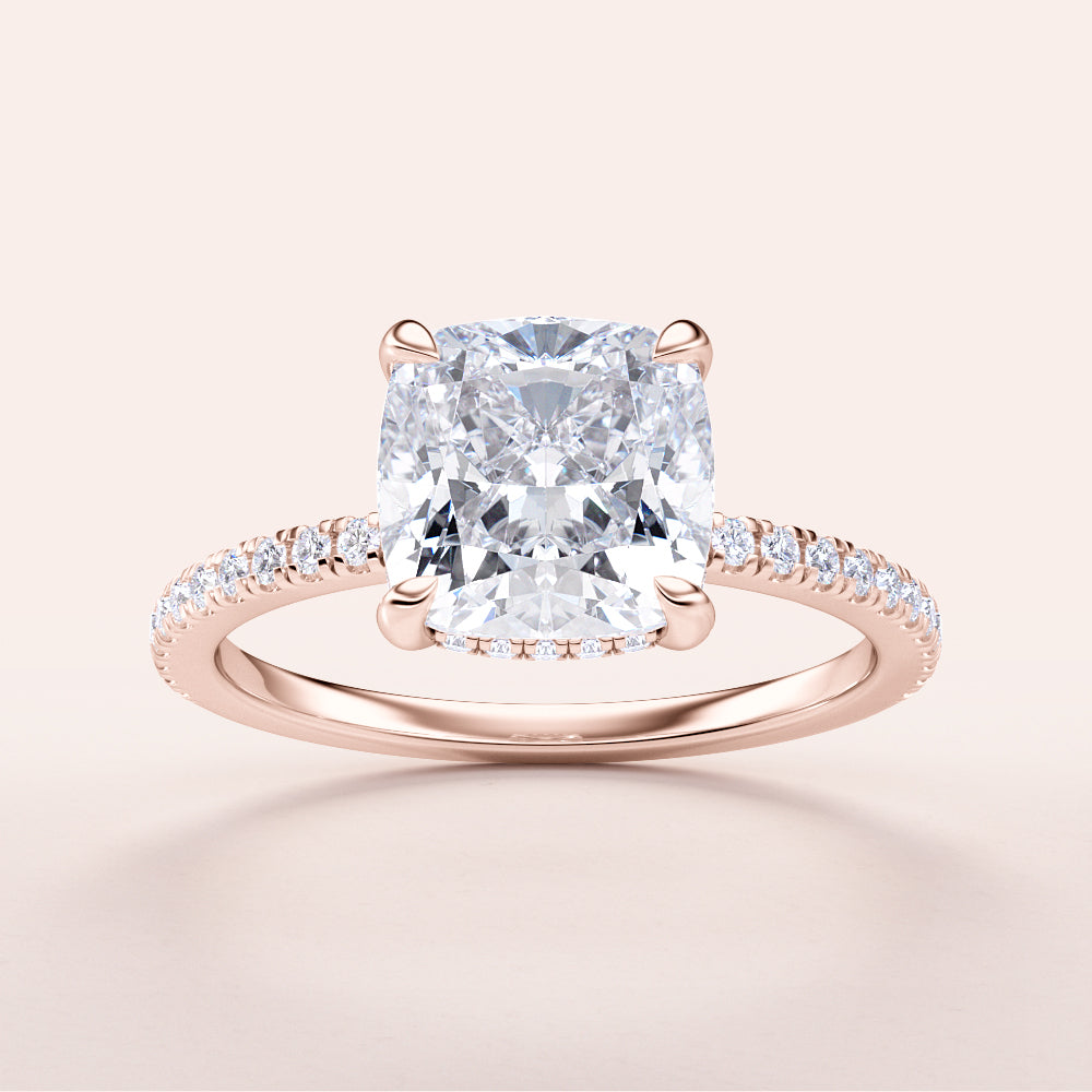 Elegant 14K/18K rose gold cushion-cut diamond engagement ring withPave band, showcasing stunning brilliance.|
#14KRecycledRoseGold
#18KRecycledRoseGold