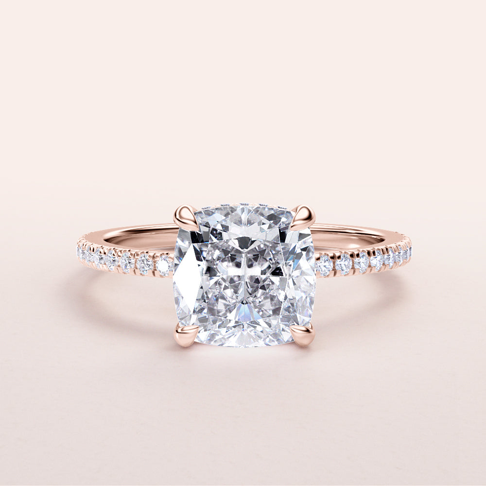 Elegant cushion-cut diamond engagement ring in 14K rose gold, featuring a pave band with dazzling diamonds.|
#14KRecycledRoseGold
#18KRecycledRoseGold