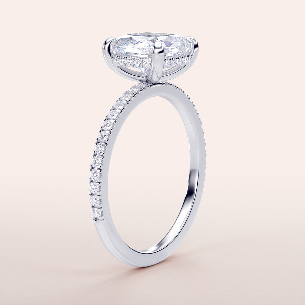 Elegant white gold engagement ring featuring a cushion-cut diamond in a hidden halo, withPave band, available in 14K and 18K options.|
#14KRecycledWhiteGold
#18KRecycledWhiteGold
#Platinum