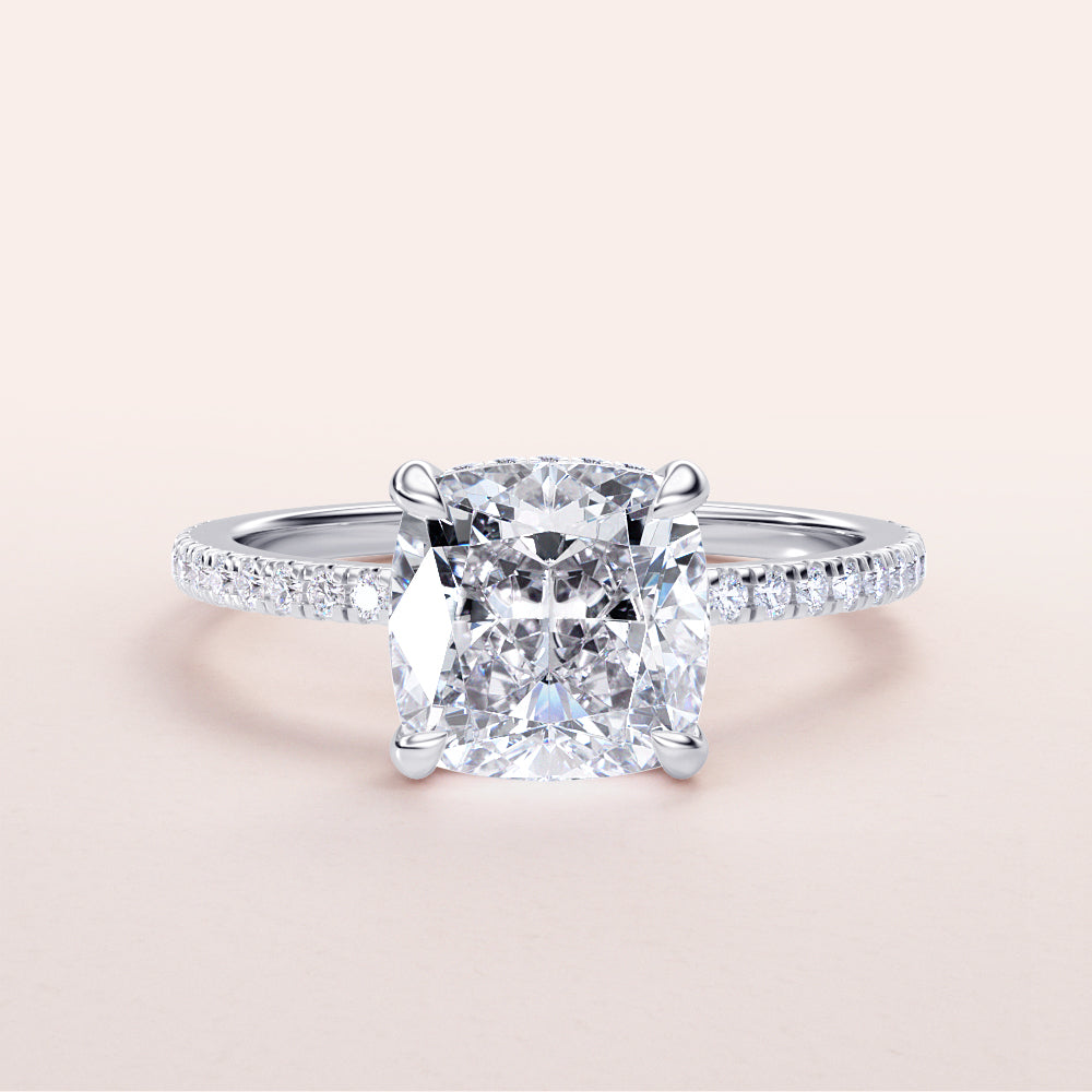 Cushion-cut diamond engagement ring with pave band in 14K or 18K white gold, perfect for a timeless proposal.|
#14KRecycledWhiteGold
#18KRecycledWhiteGold
#Platinum